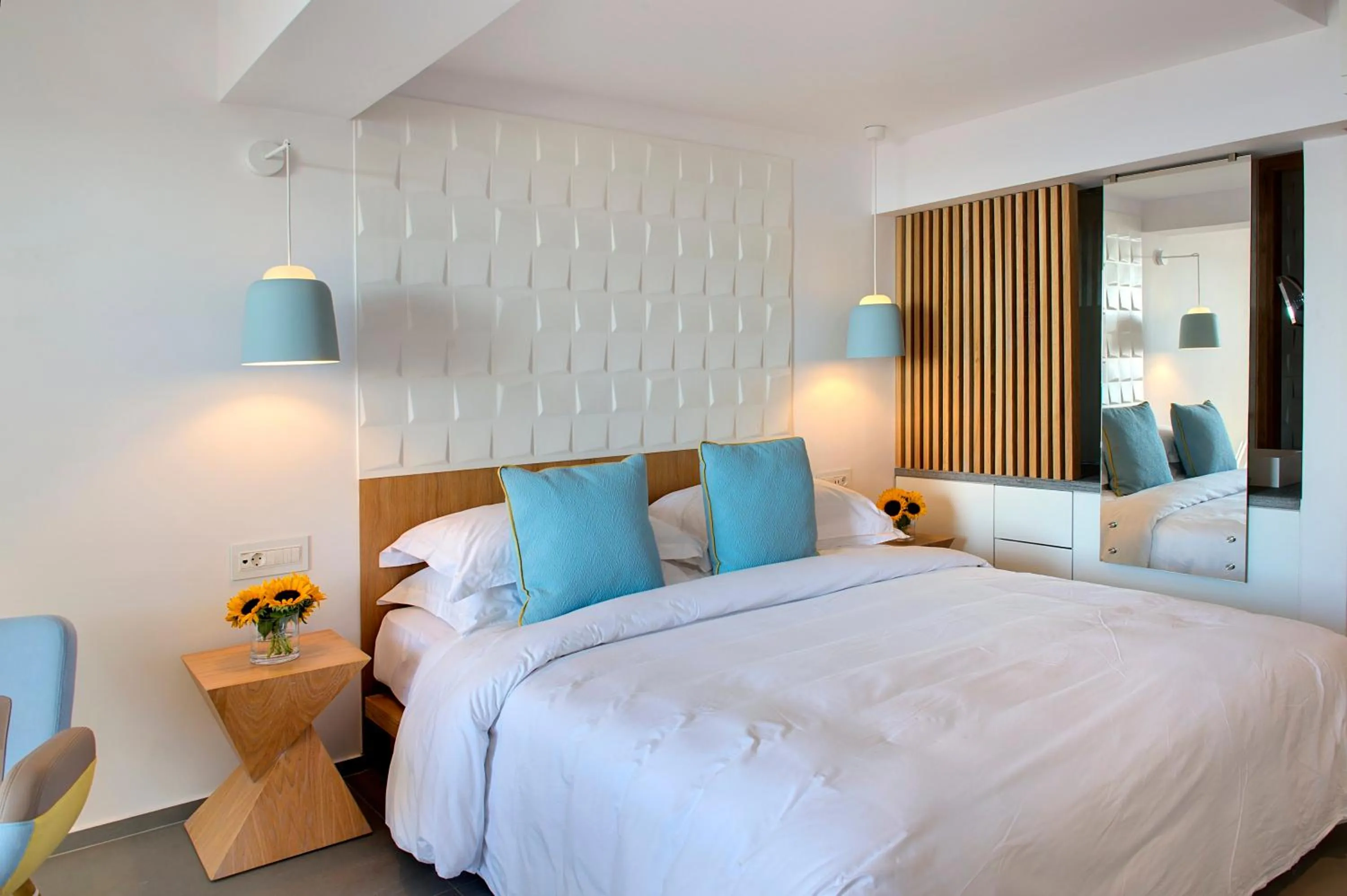 Bed in Myconian Korali Relais & Chateaux