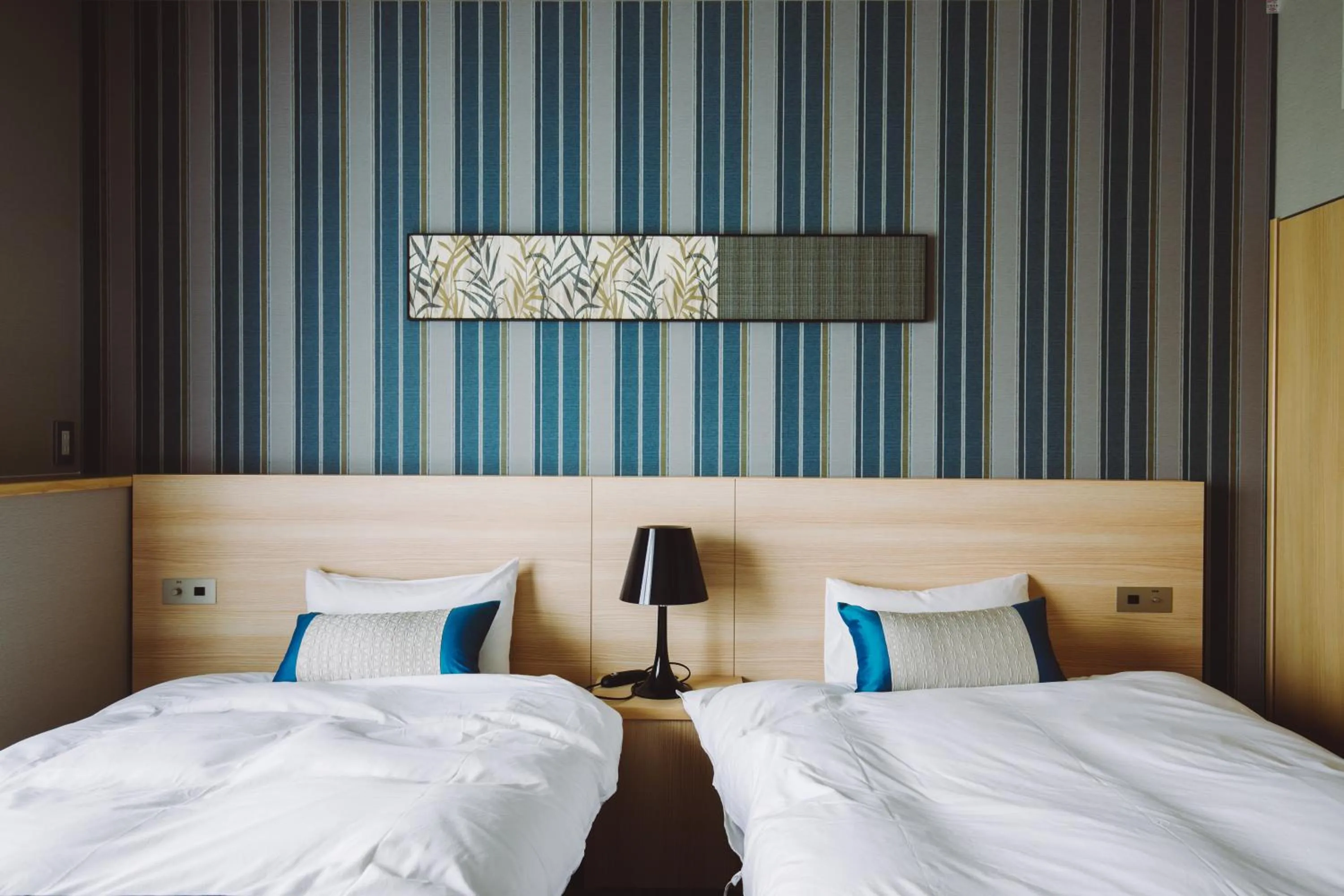 Bed in Oyado Shinmachi Gojo