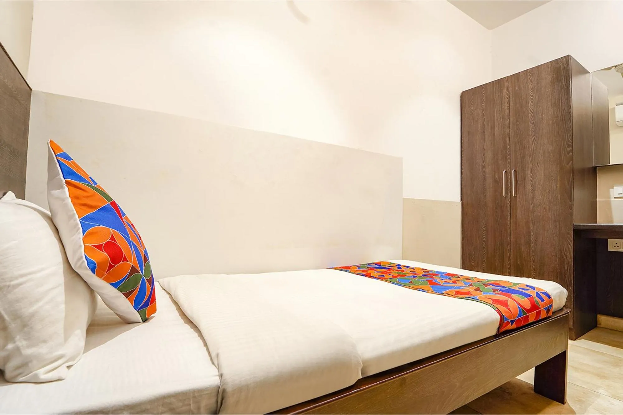 Bed in FabHotel Karpagam - 900m from Nehru Stadium