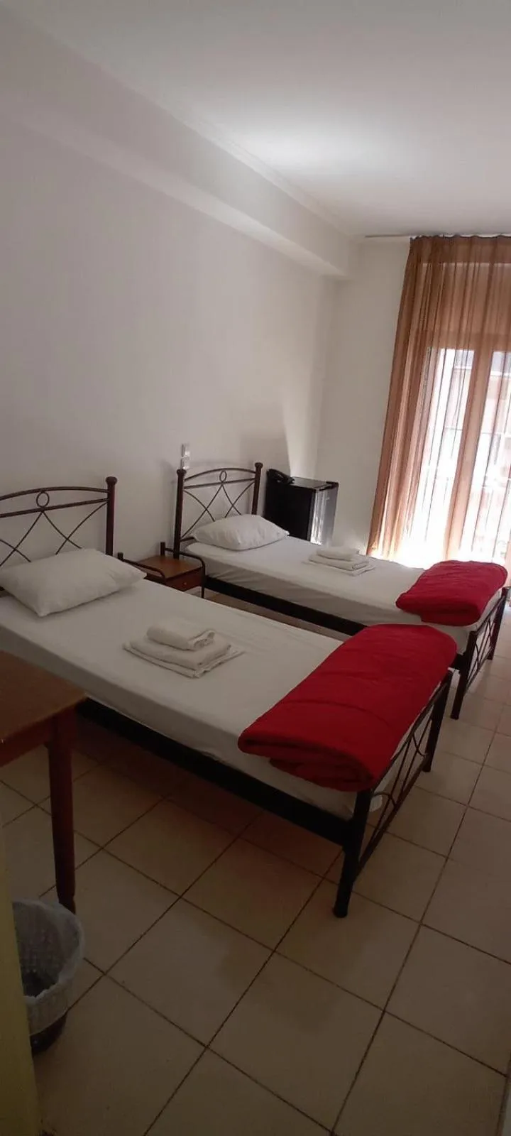 Bed in Delfini Hotel