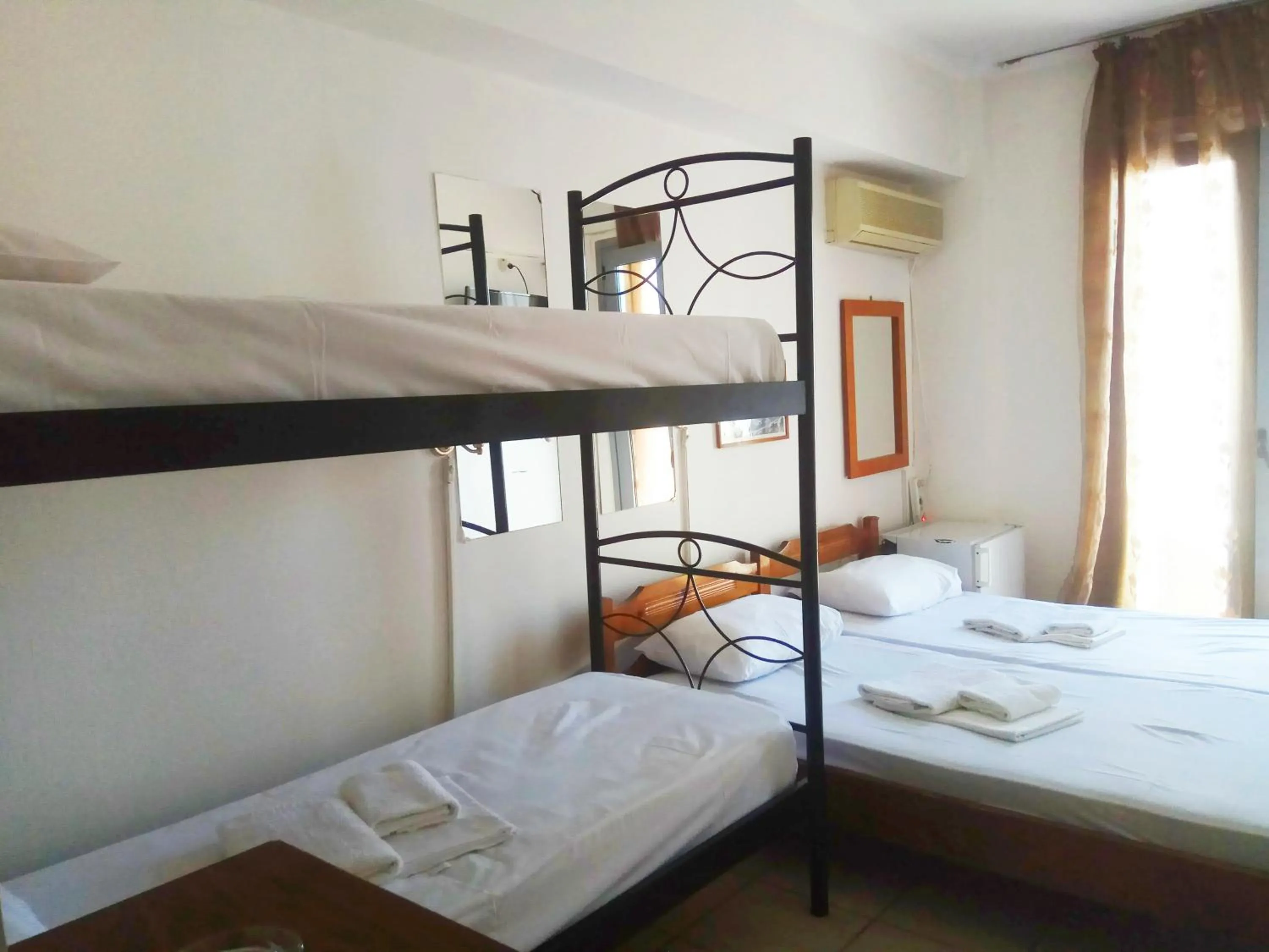 Bed in Delfini Hotel