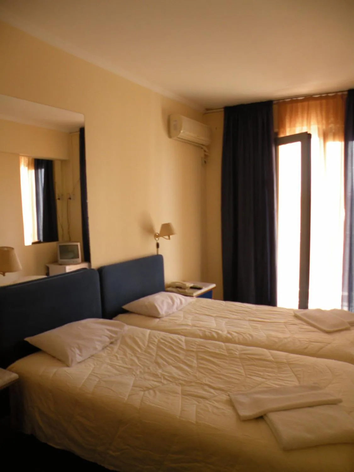 Bed in Delfini Hotel