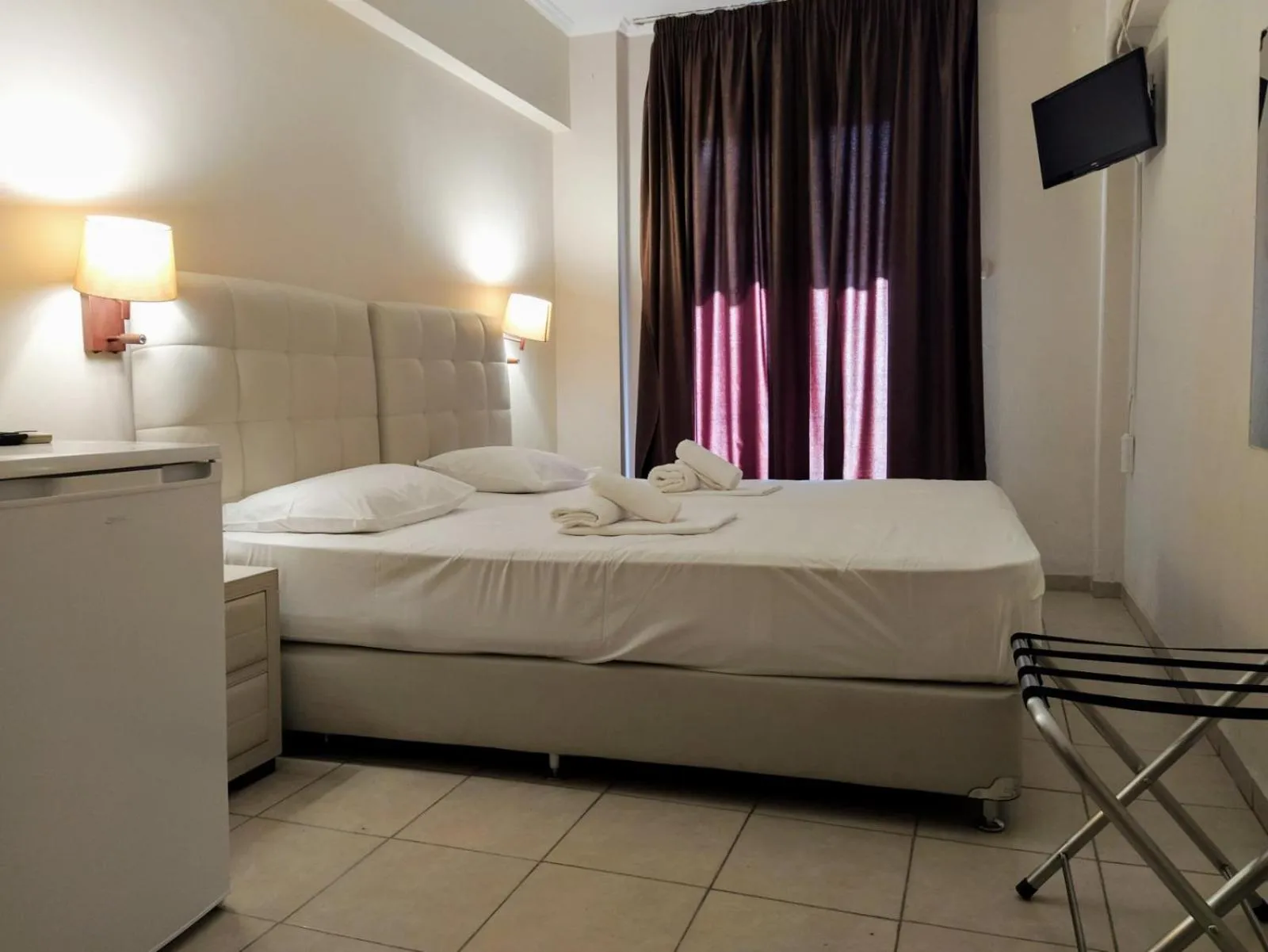 Bed in Delfini Hotel