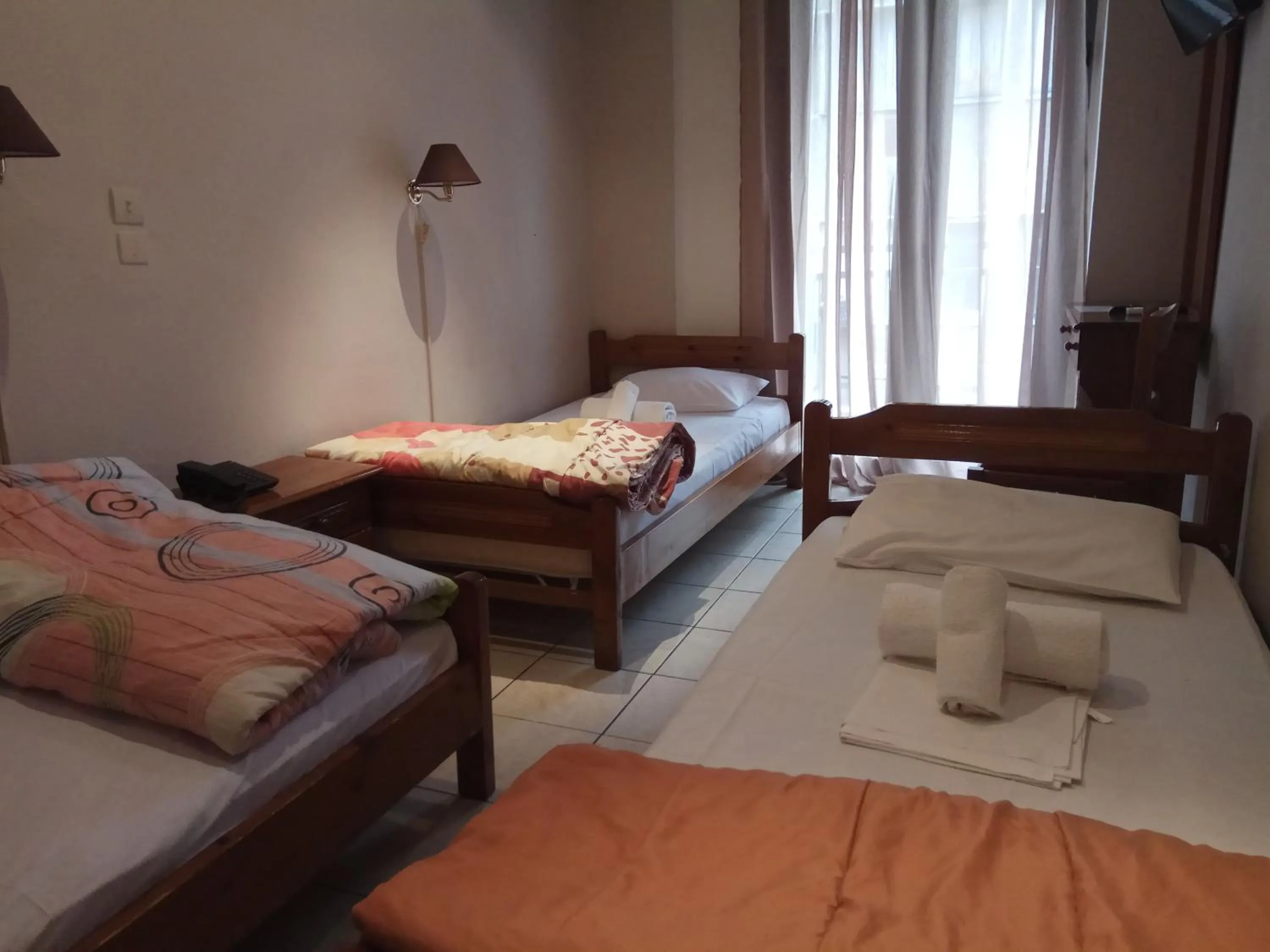 Bed in Delfini Hotel