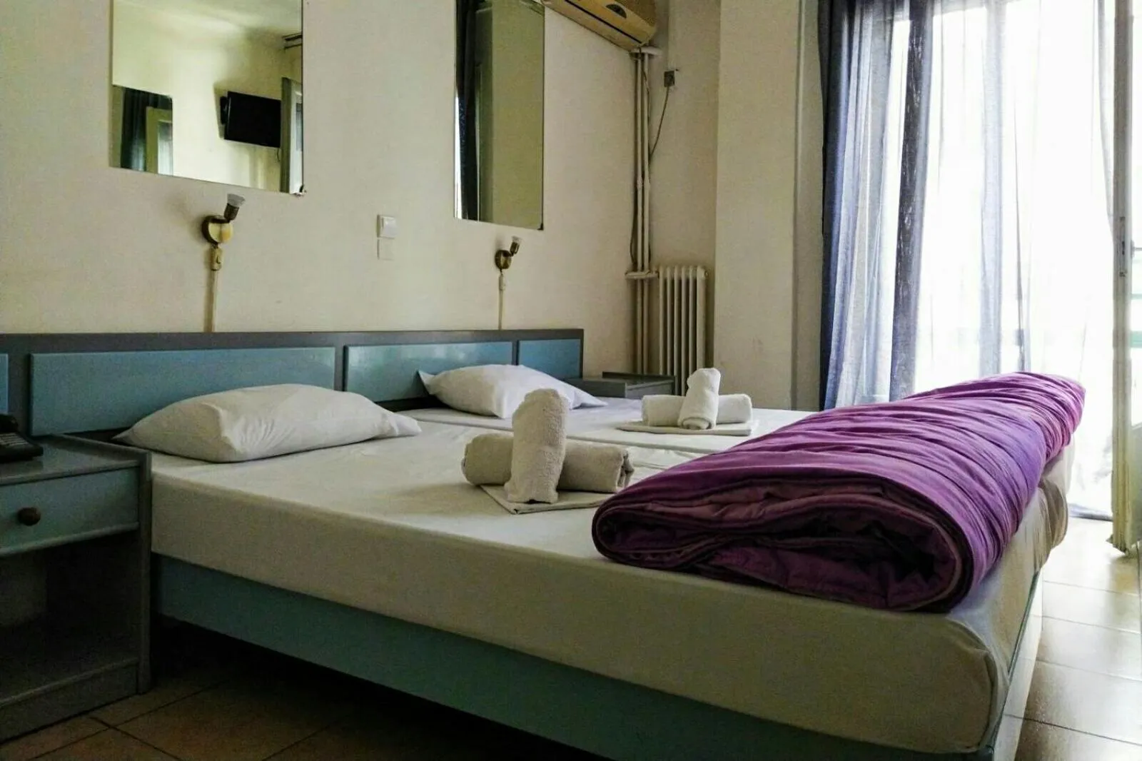 Bed in Delfini Hotel
