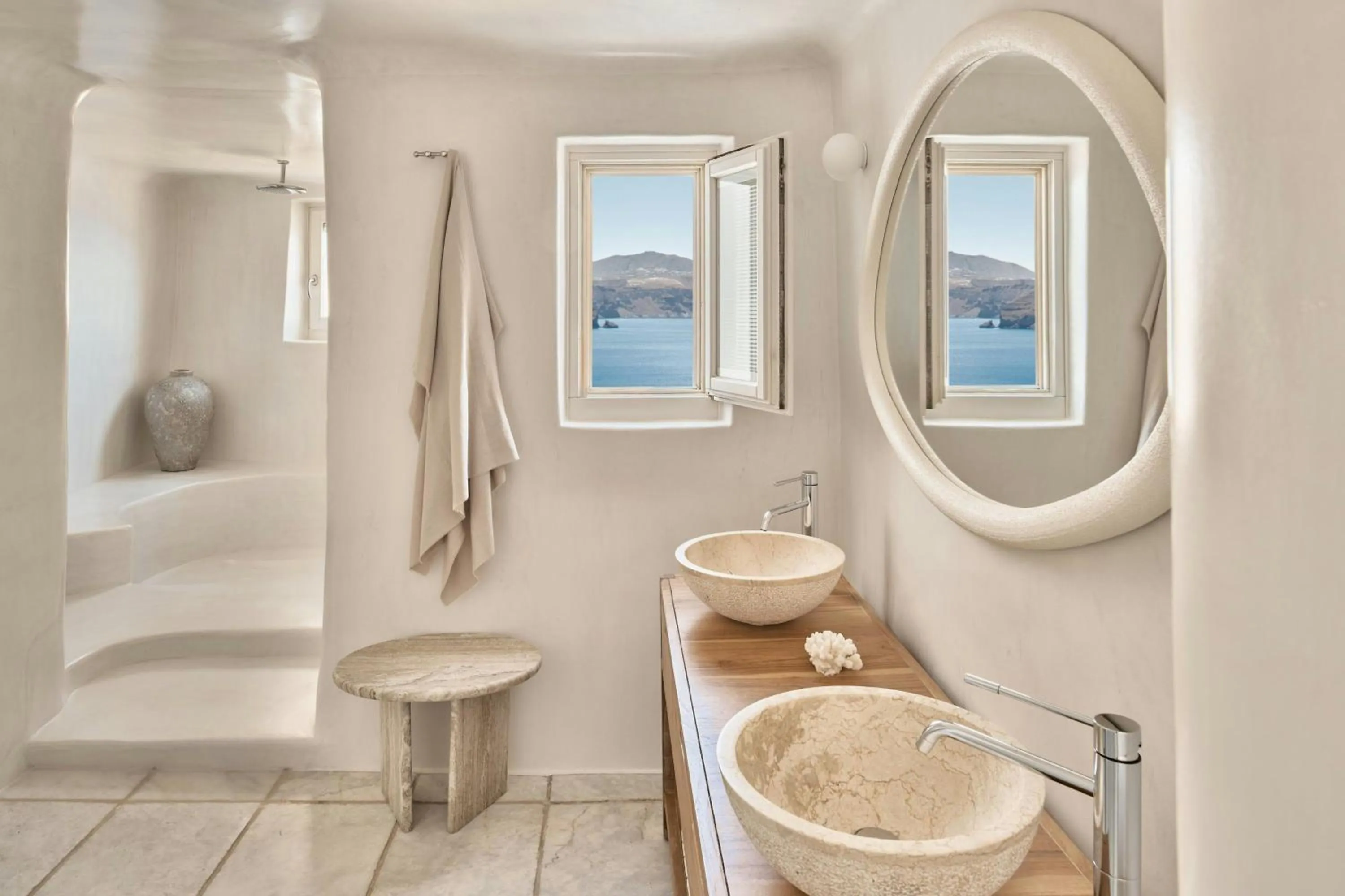 Photo of the whole room in Mystique, a Luxury Collection Hotel, Santorini