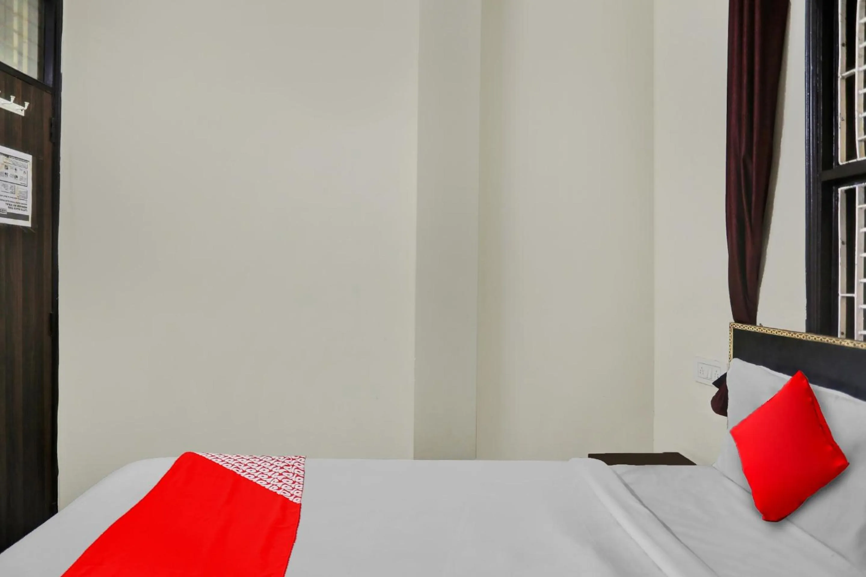 Bedroom in Hotel O Sun Shine