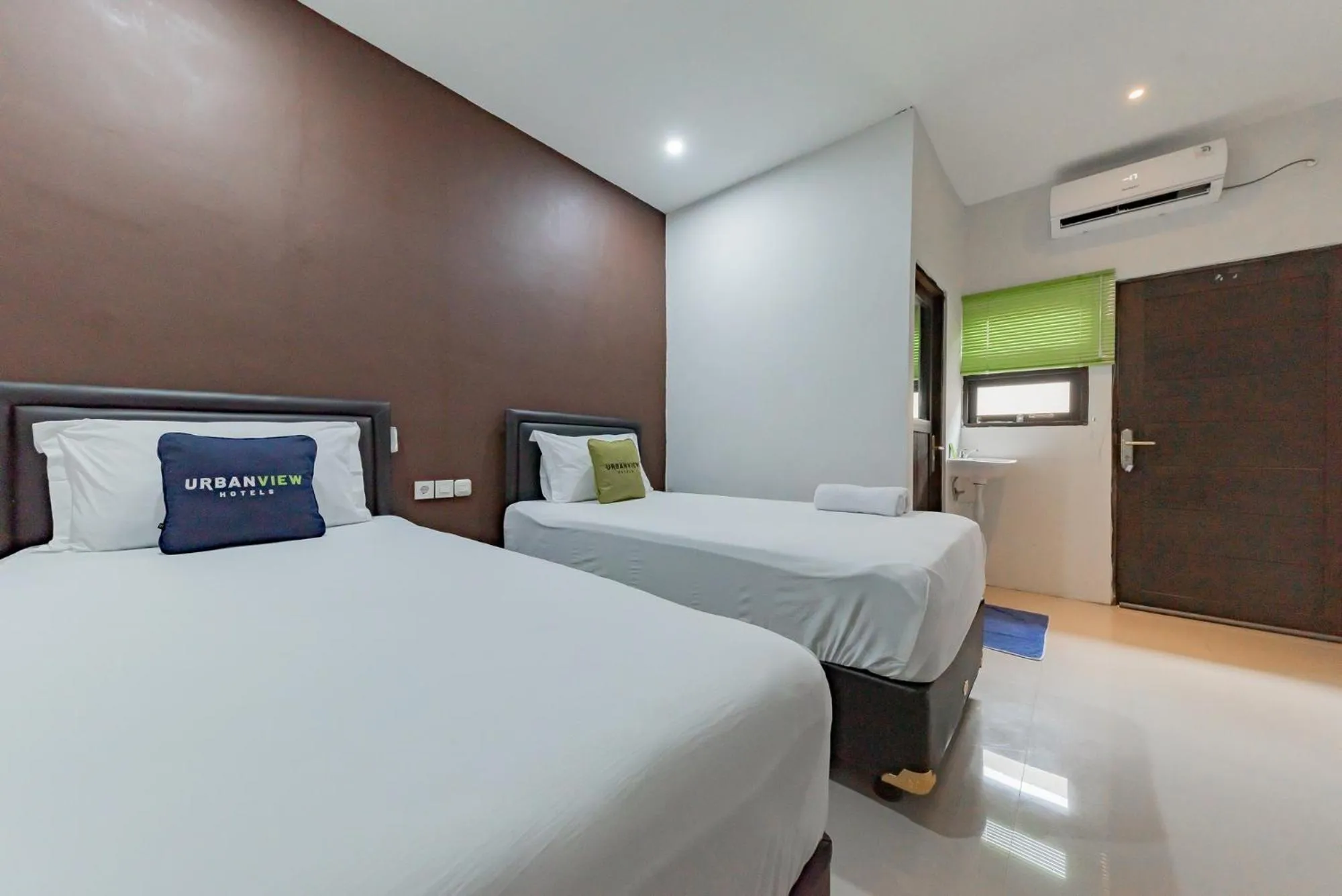 Bed in Urbanview Hotel Yoga Palangkaraya by RedDoorz
