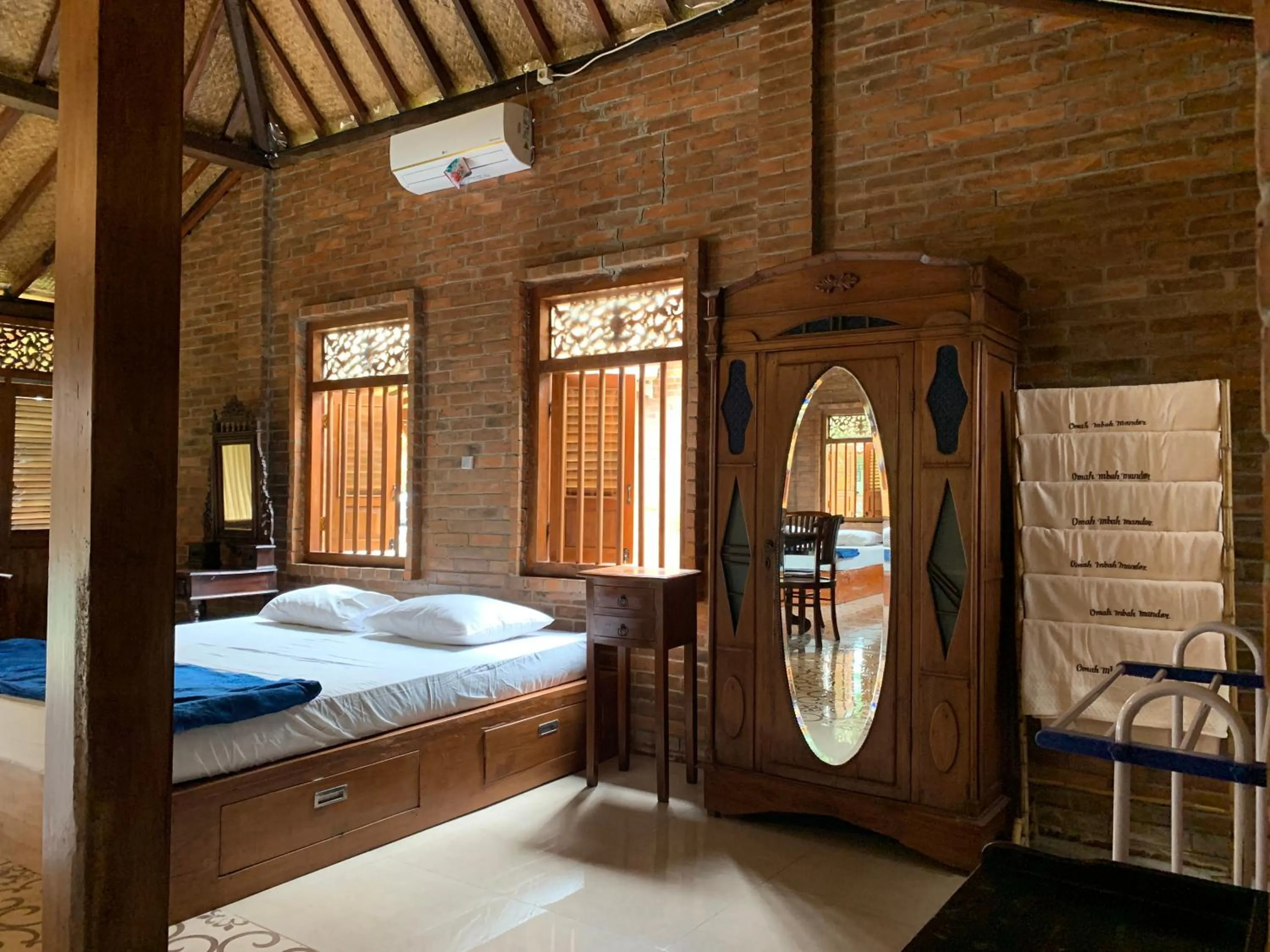 Bedroom in Omah Mbah Mandor by The Lavana
