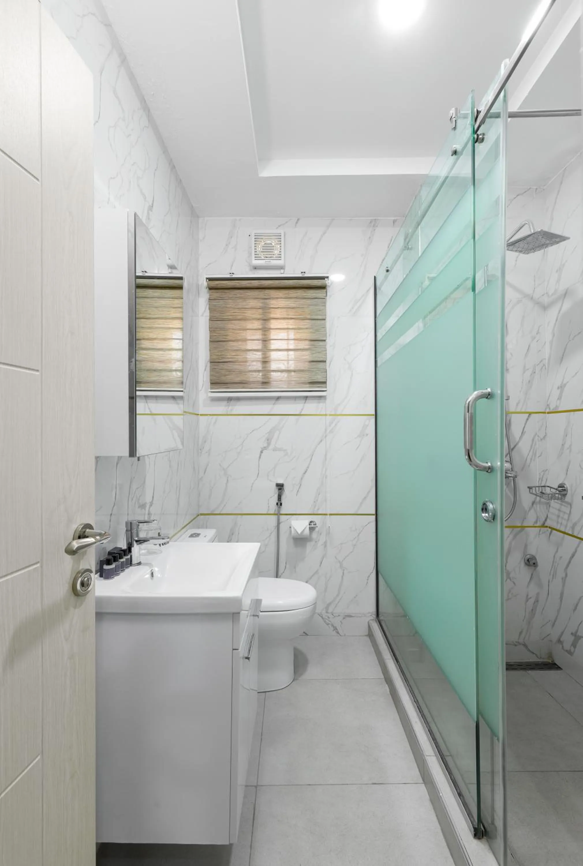 Shower in BKT Cribs - Apartments & Suites