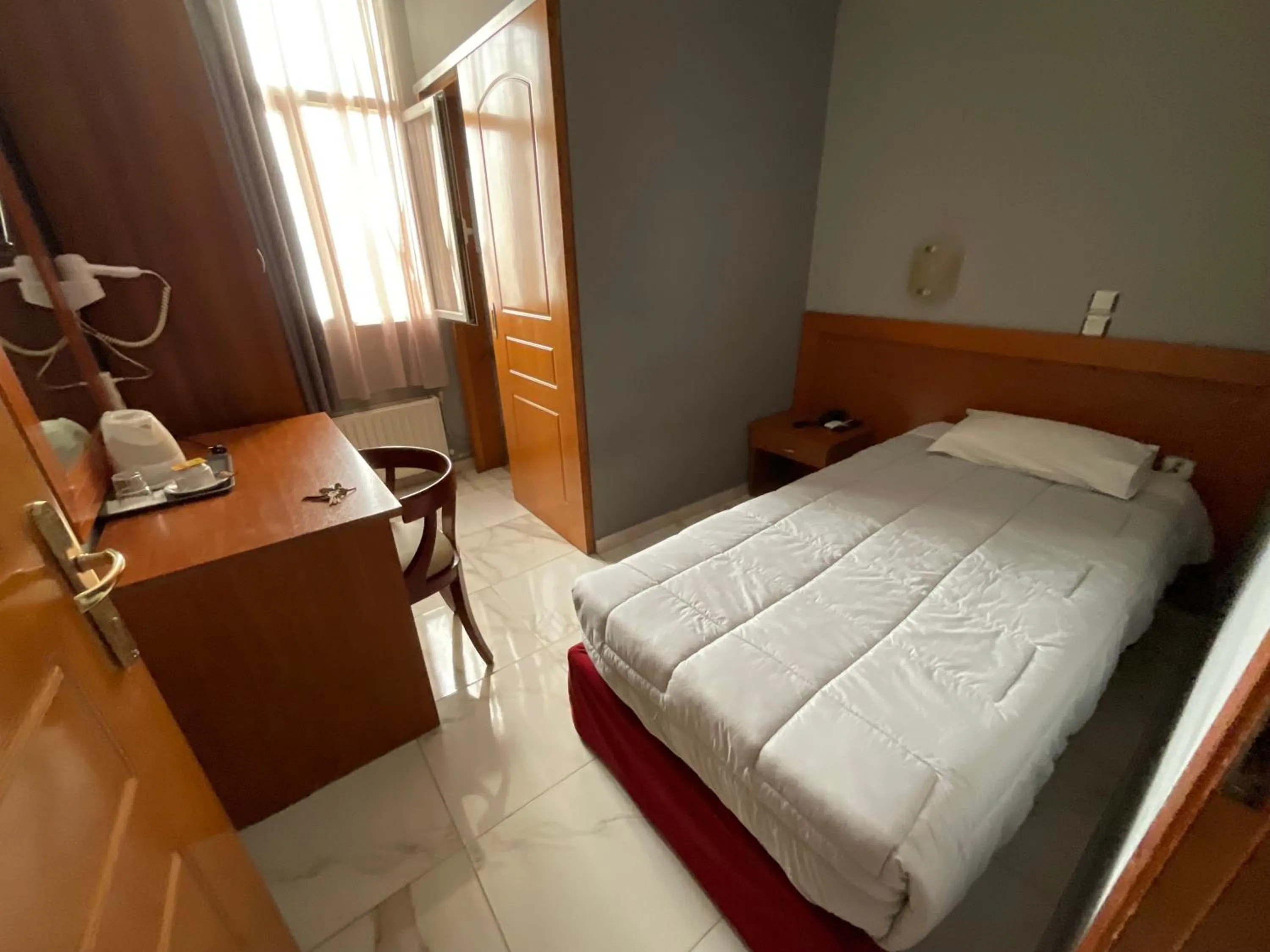 Photo of the whole room, Bed in Piraeus Acropole Hotel