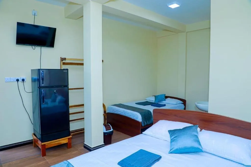 Bed in UK Inn Guest House