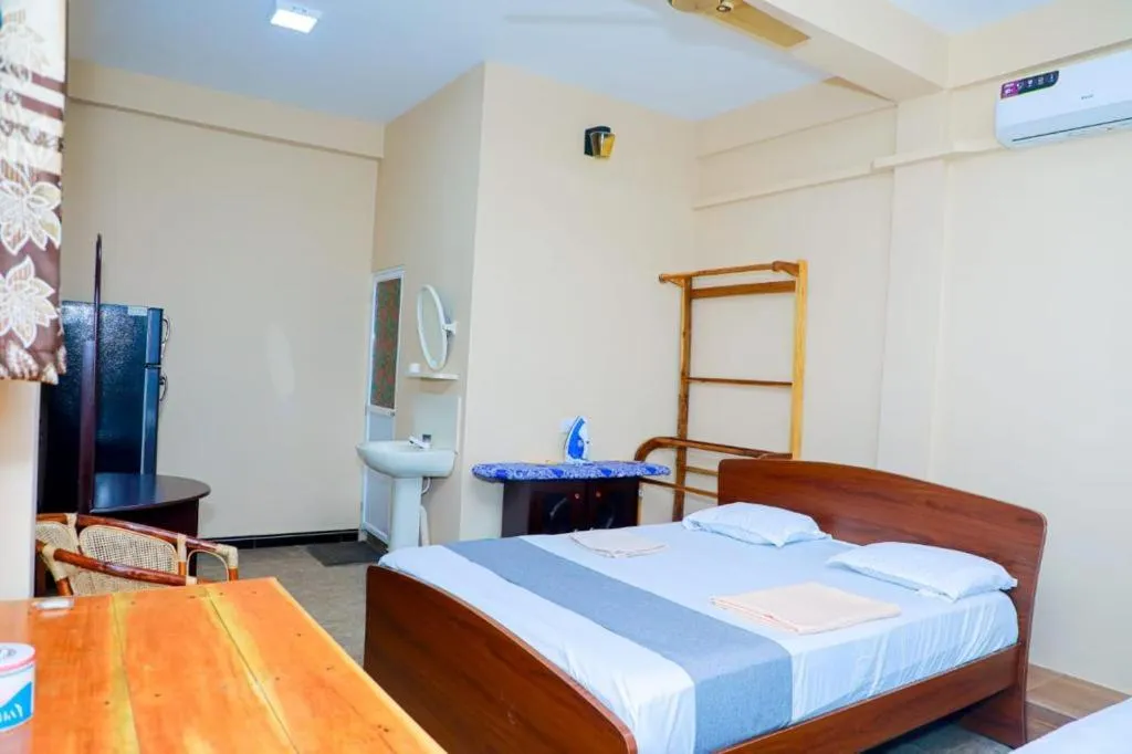 Bed in UK Inn Guest House