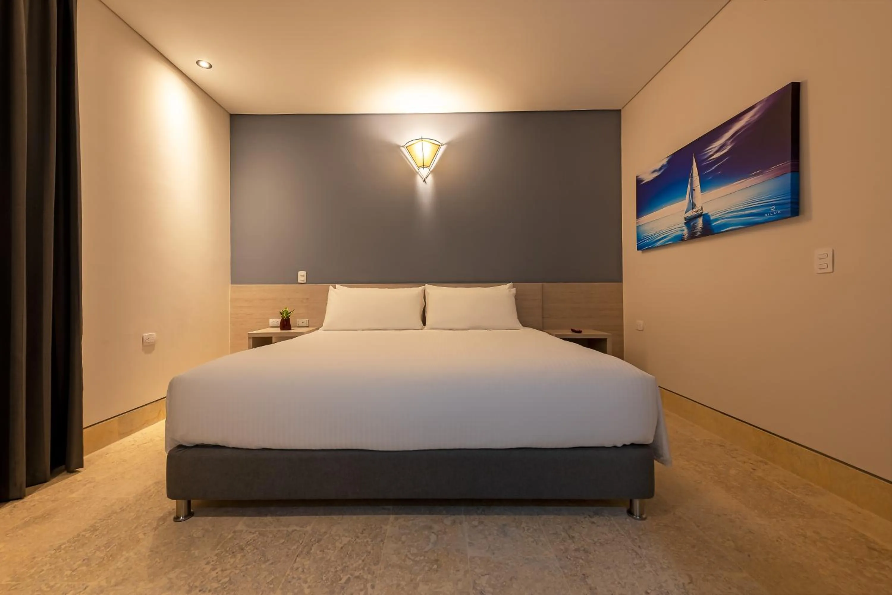 Photo of the whole room, Bed in Hotel Rilux Cartagena