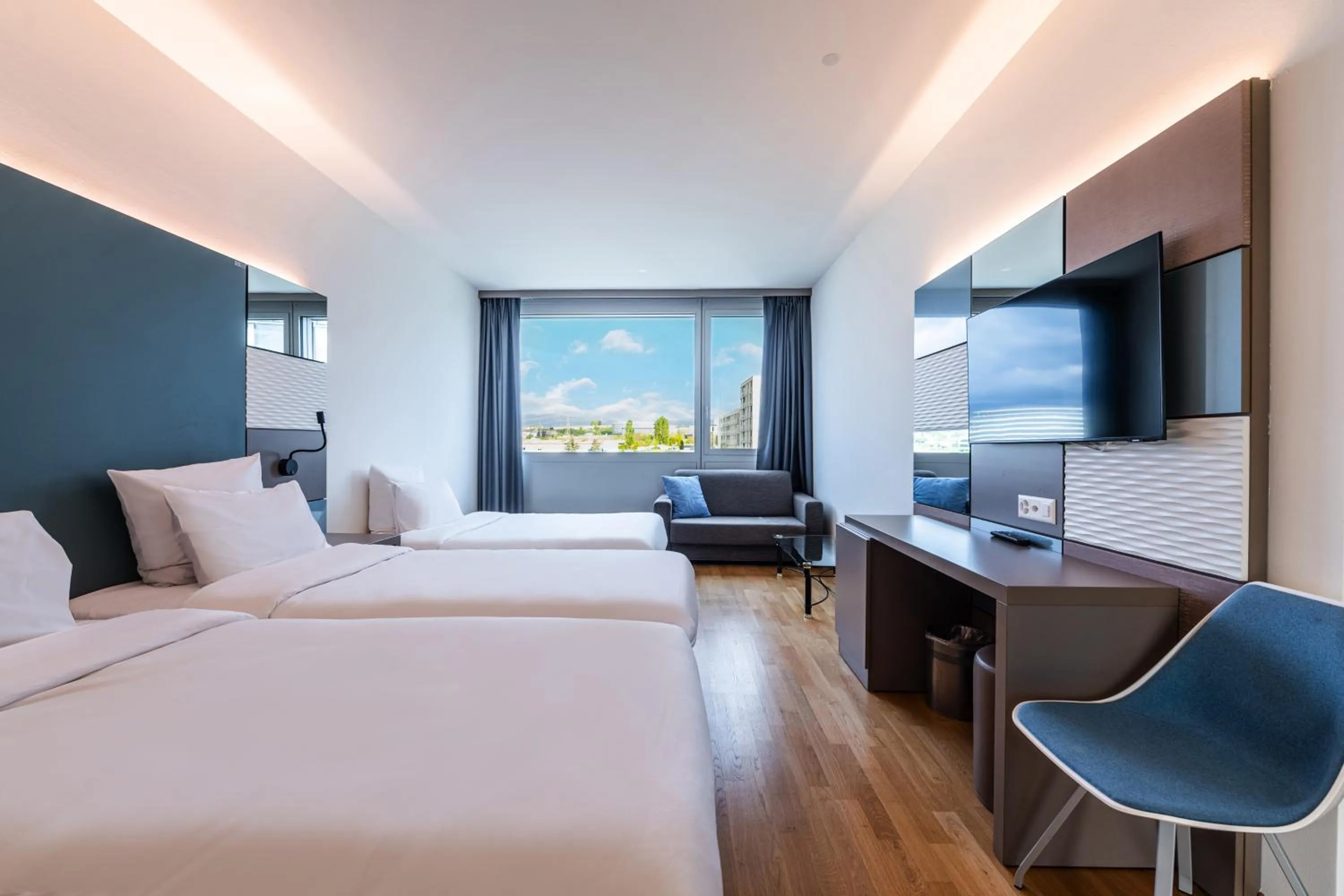 Seating area, Bed in B&B HOTEL Lausanne Crissier