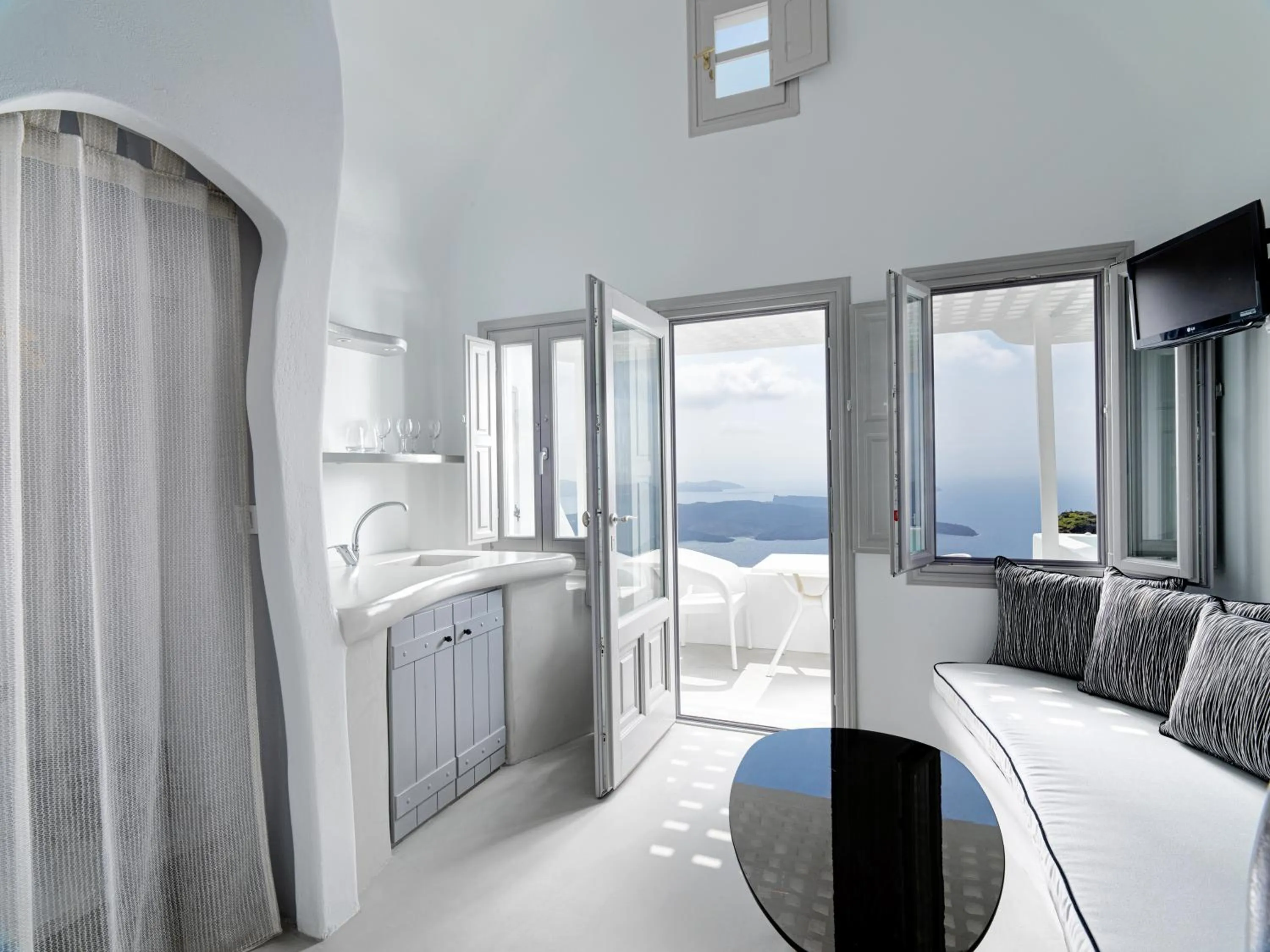 Seating area, Bed in Tholos Resort