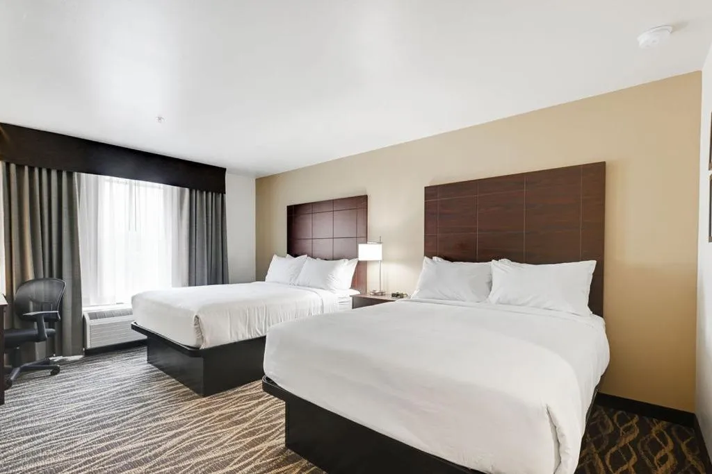 Bed in Cobblestone Hotel & Suites - Mosinee