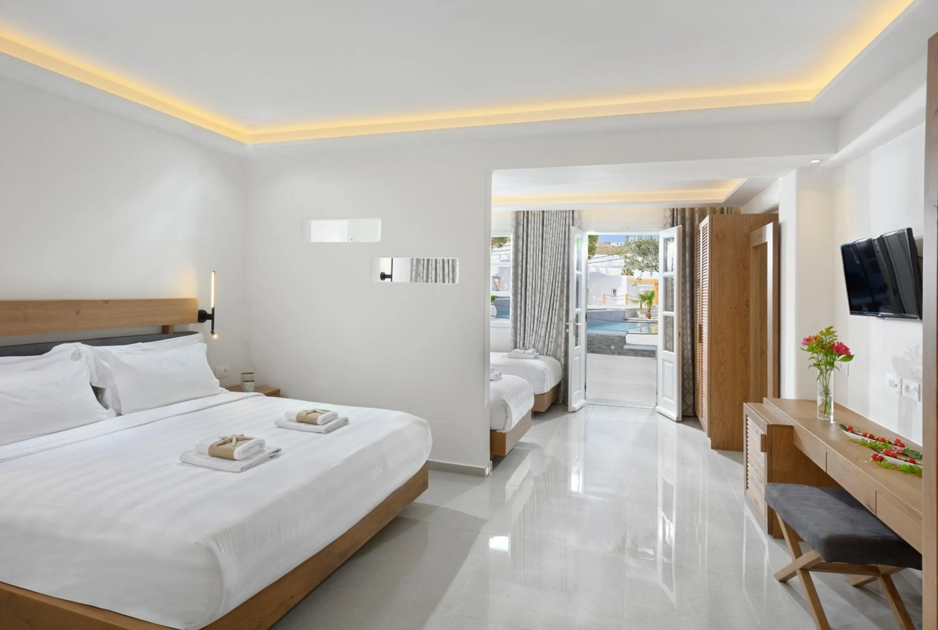 Bed in Petinos Hotel