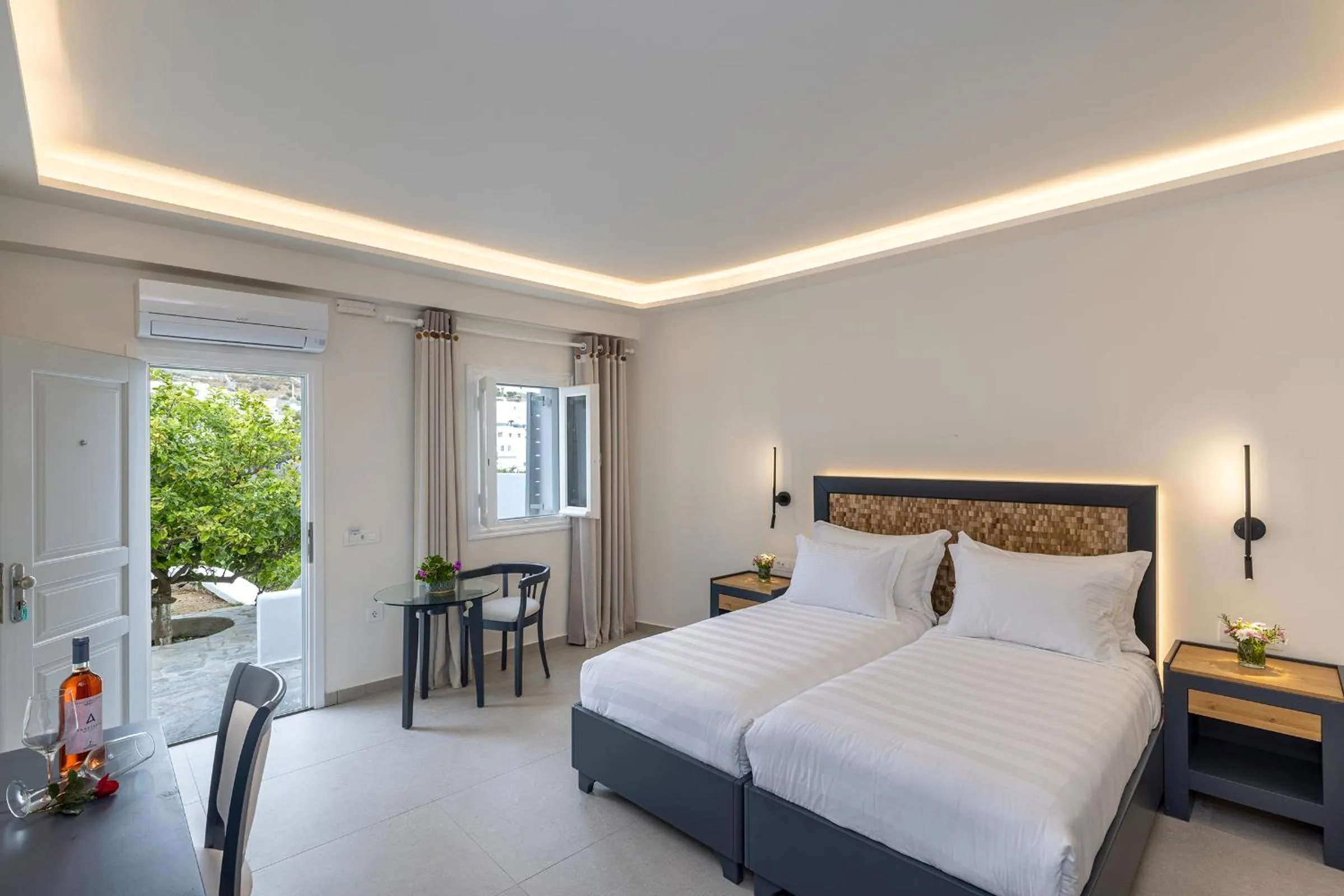 Bed in Petinos Hotel