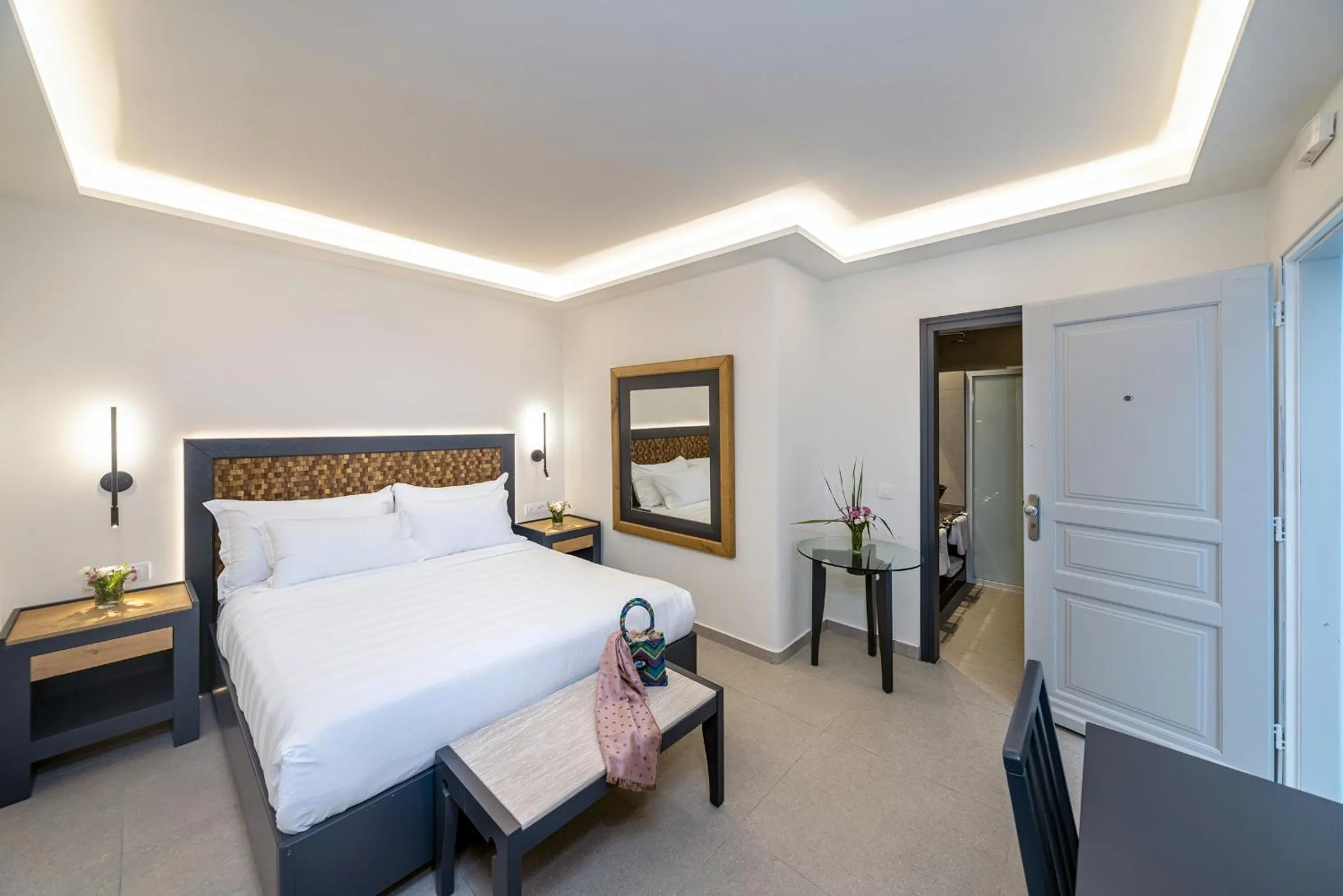 Bed in Petinos Hotel