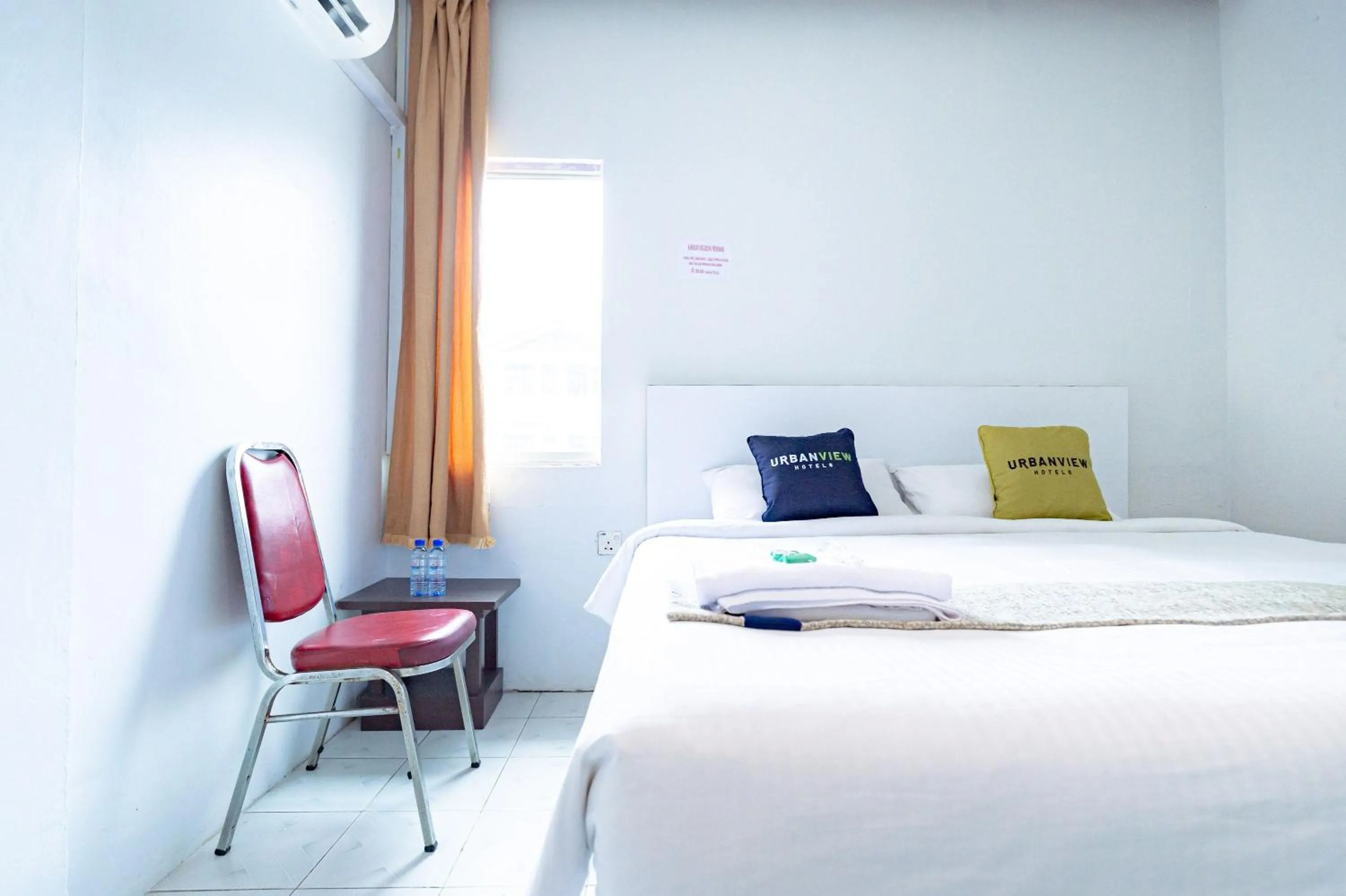 Bedroom, Bed in Urbanview Hotel Crystal Nagoya Batam by RedDoorz