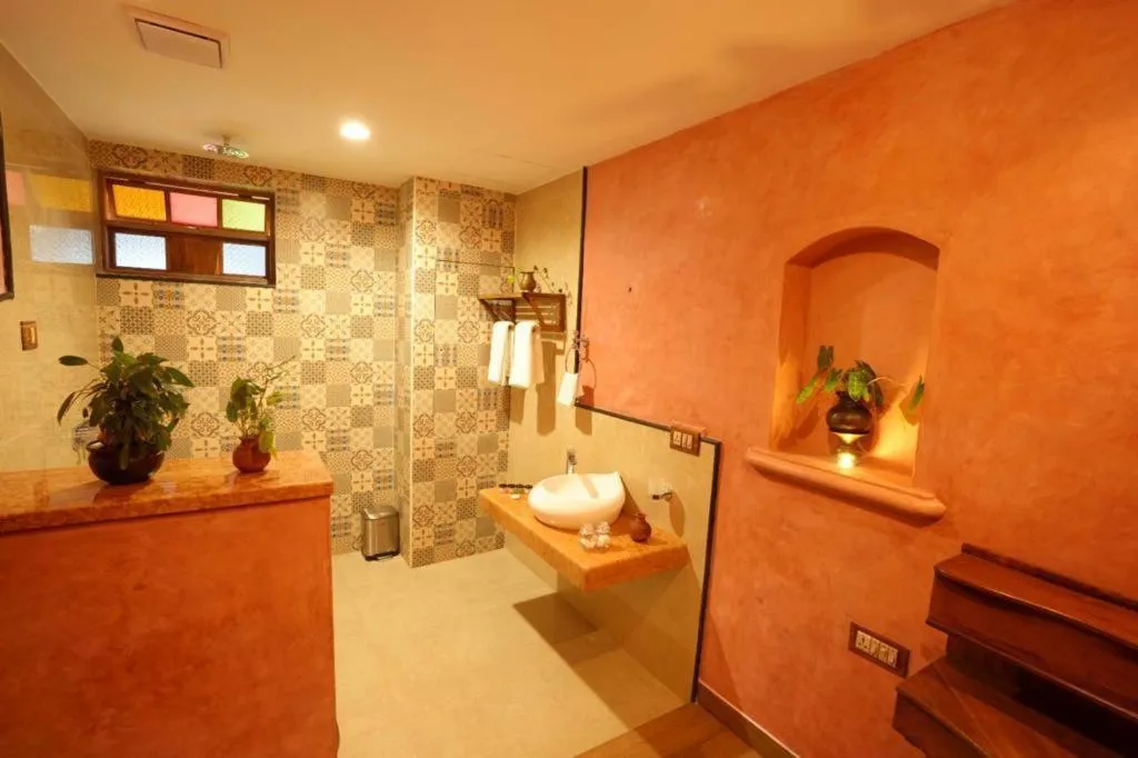 Shower in Marari Beach Bungalow Resort Alleppey