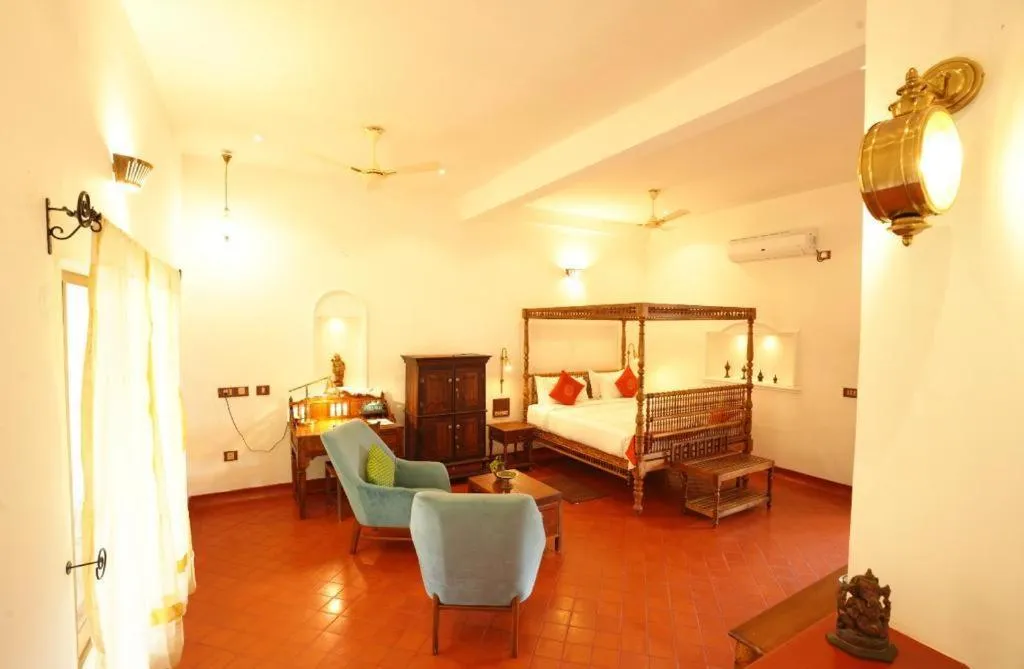 Bed in Marari Beach Bungalow Resort Alleppey