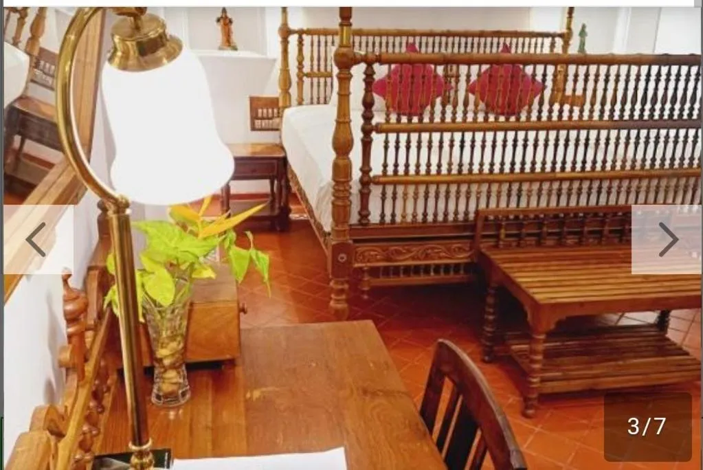 Bed in Marari Beach Bungalow Resort Alleppey