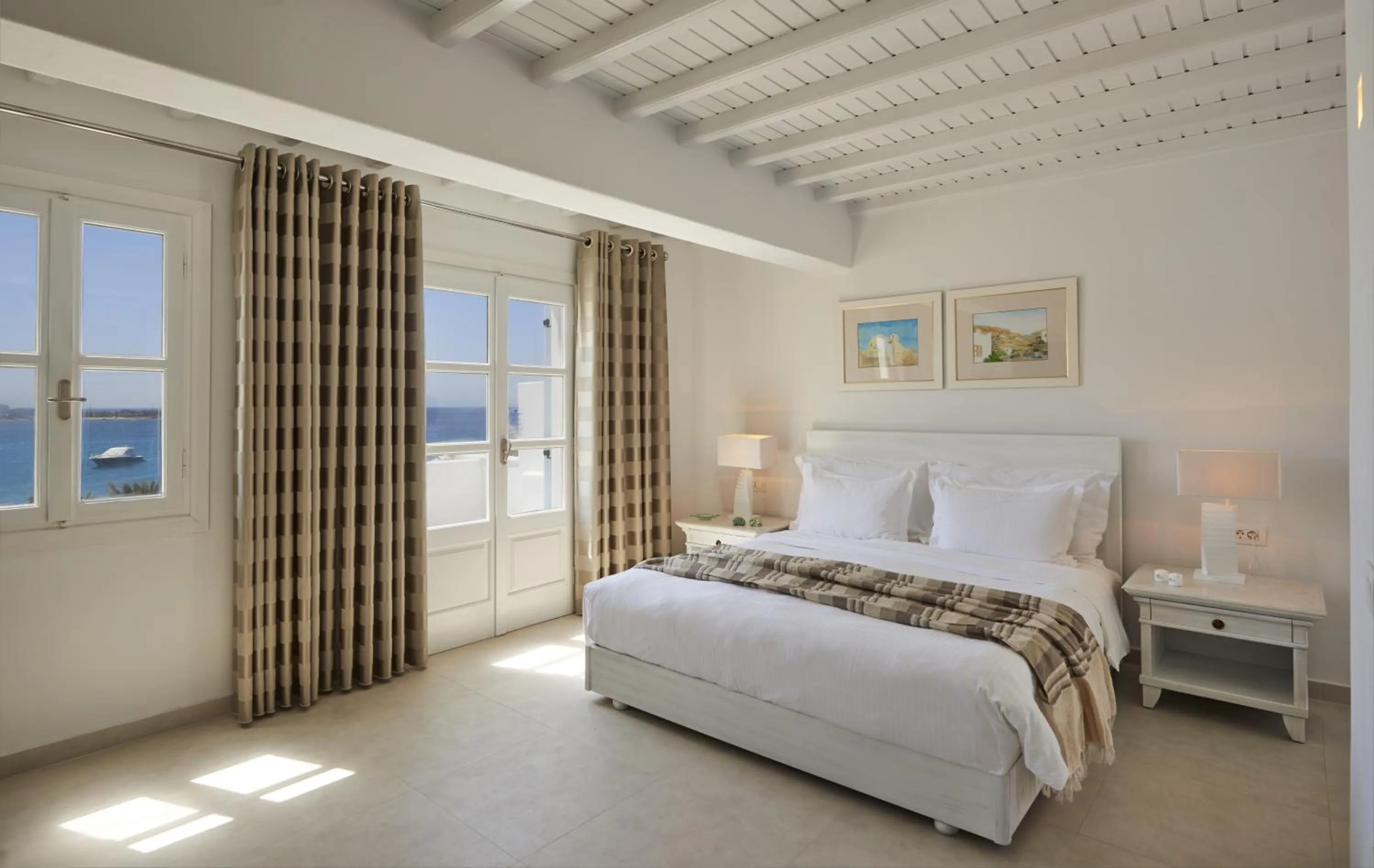 Bed in Petinos Beach Hotel