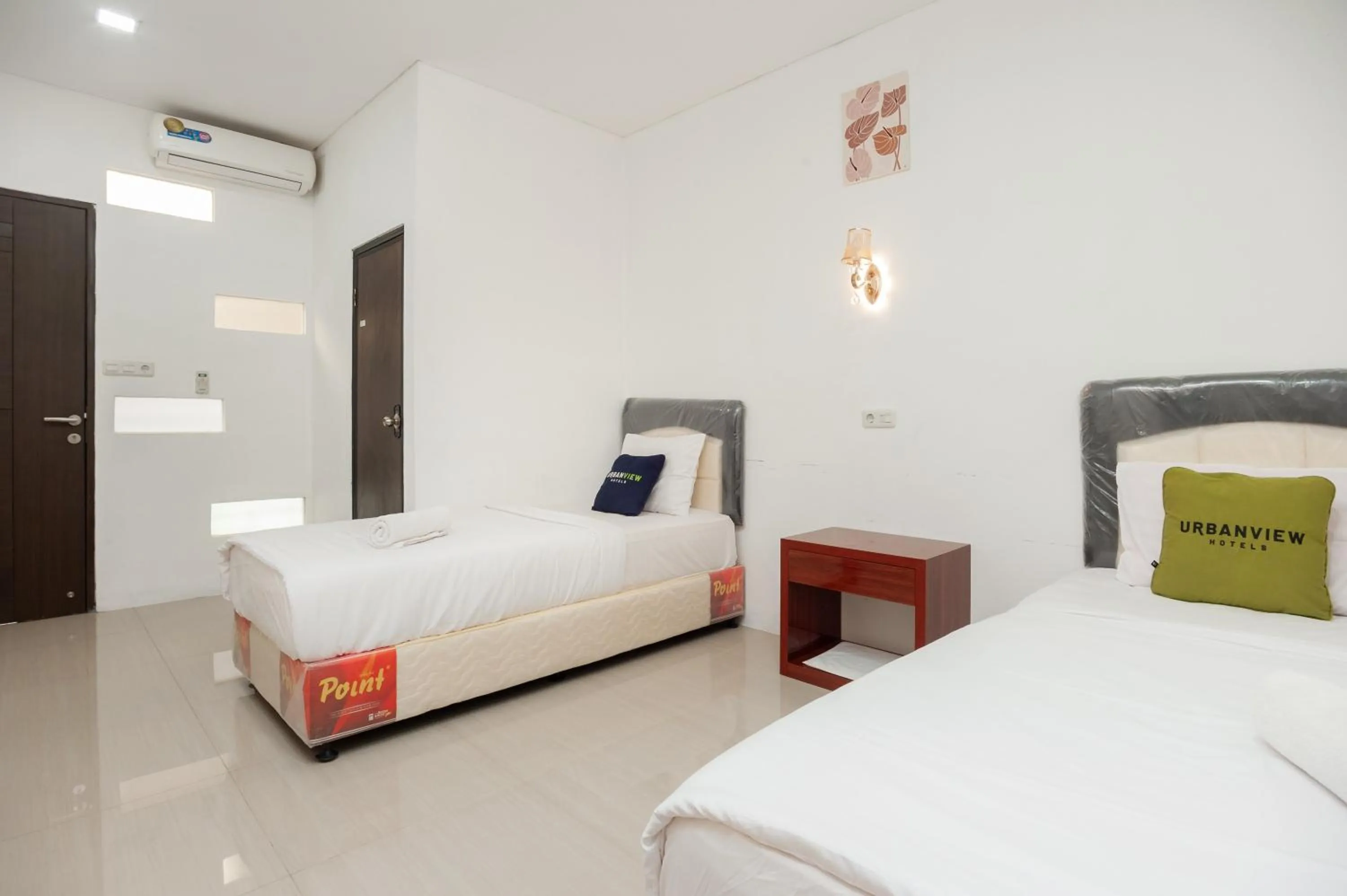 Bed in Urbanview Hotel Amarilis Sentul Bogor by RedDoorz