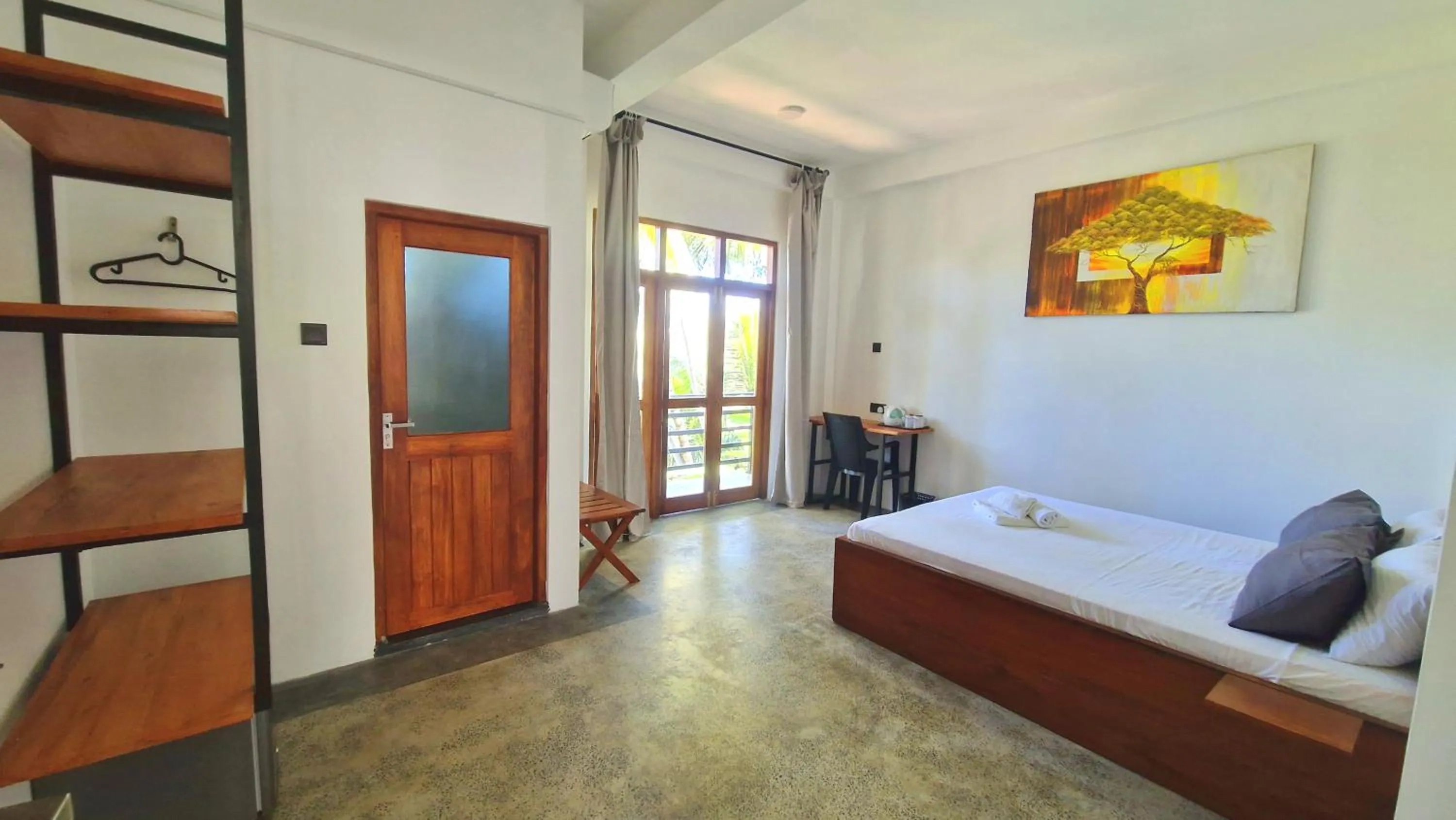 Photo of the whole room, Bed in Mothership