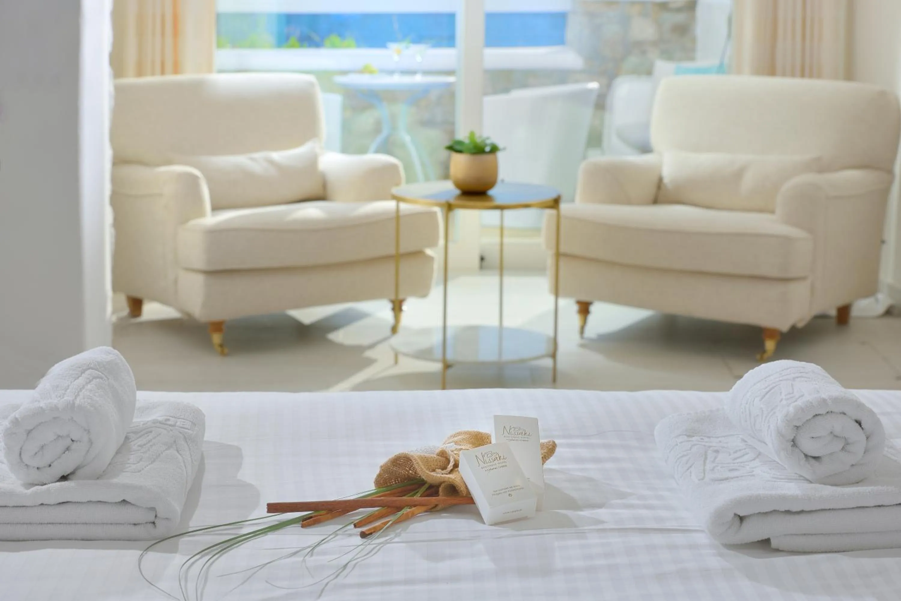 Seating area, Bed in Nissaki Boutique Hotel