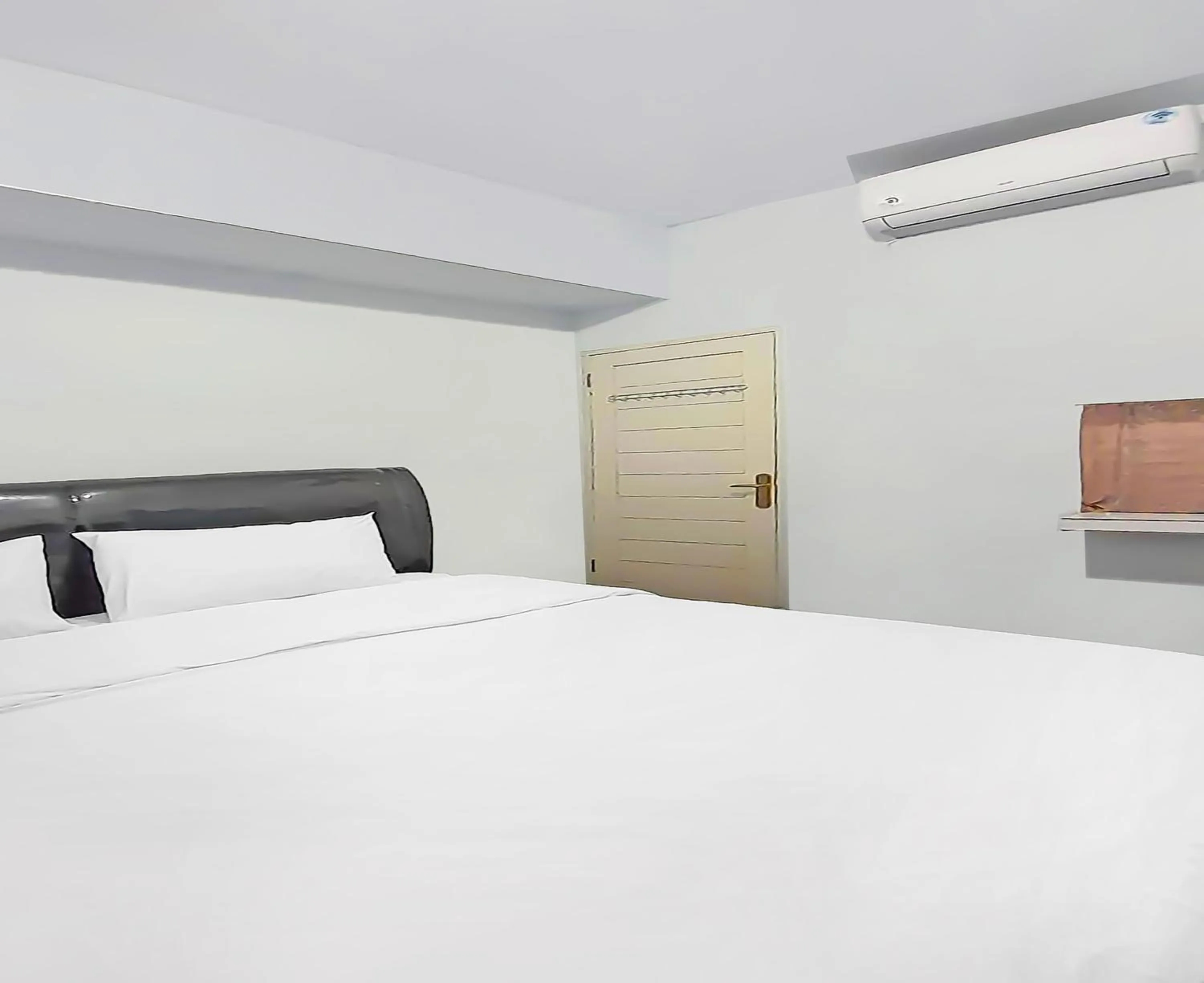 Bedroom, Bed in SPOT ON 92236 Kediri Family Homestay