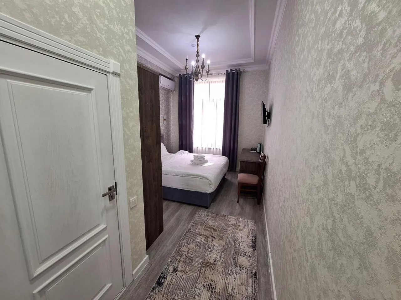 Bed in OLD STATION HOTEL