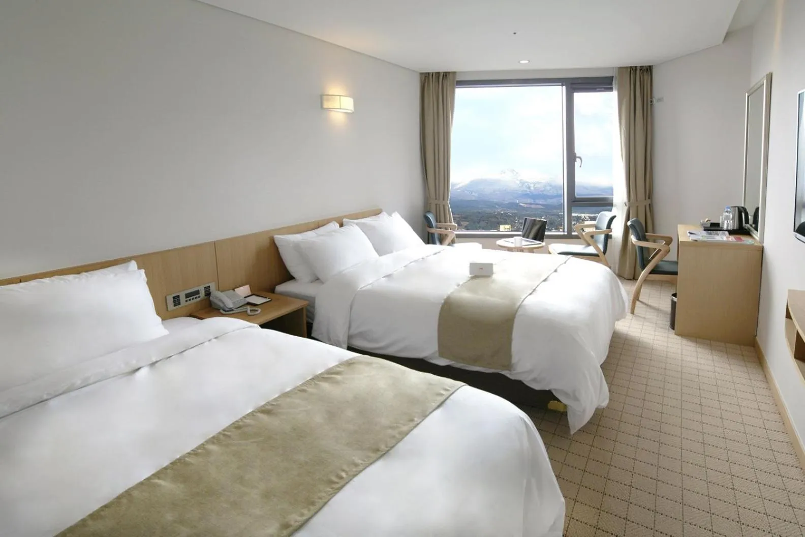 Bed in Jeju Hotel the M