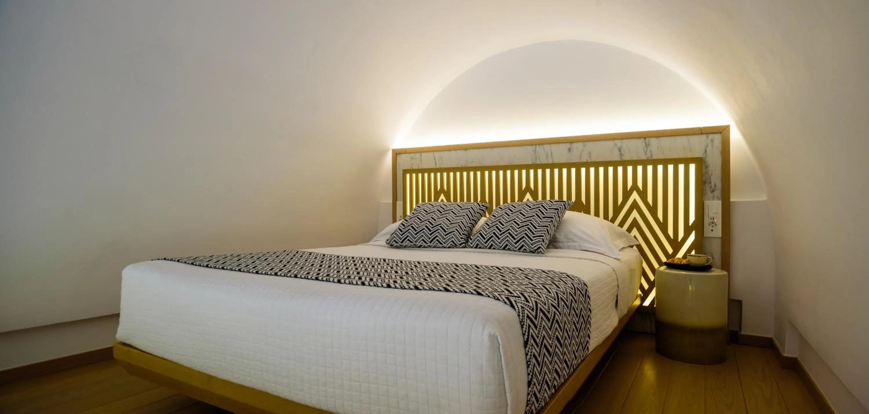 Bed in Astir Thira Hotel