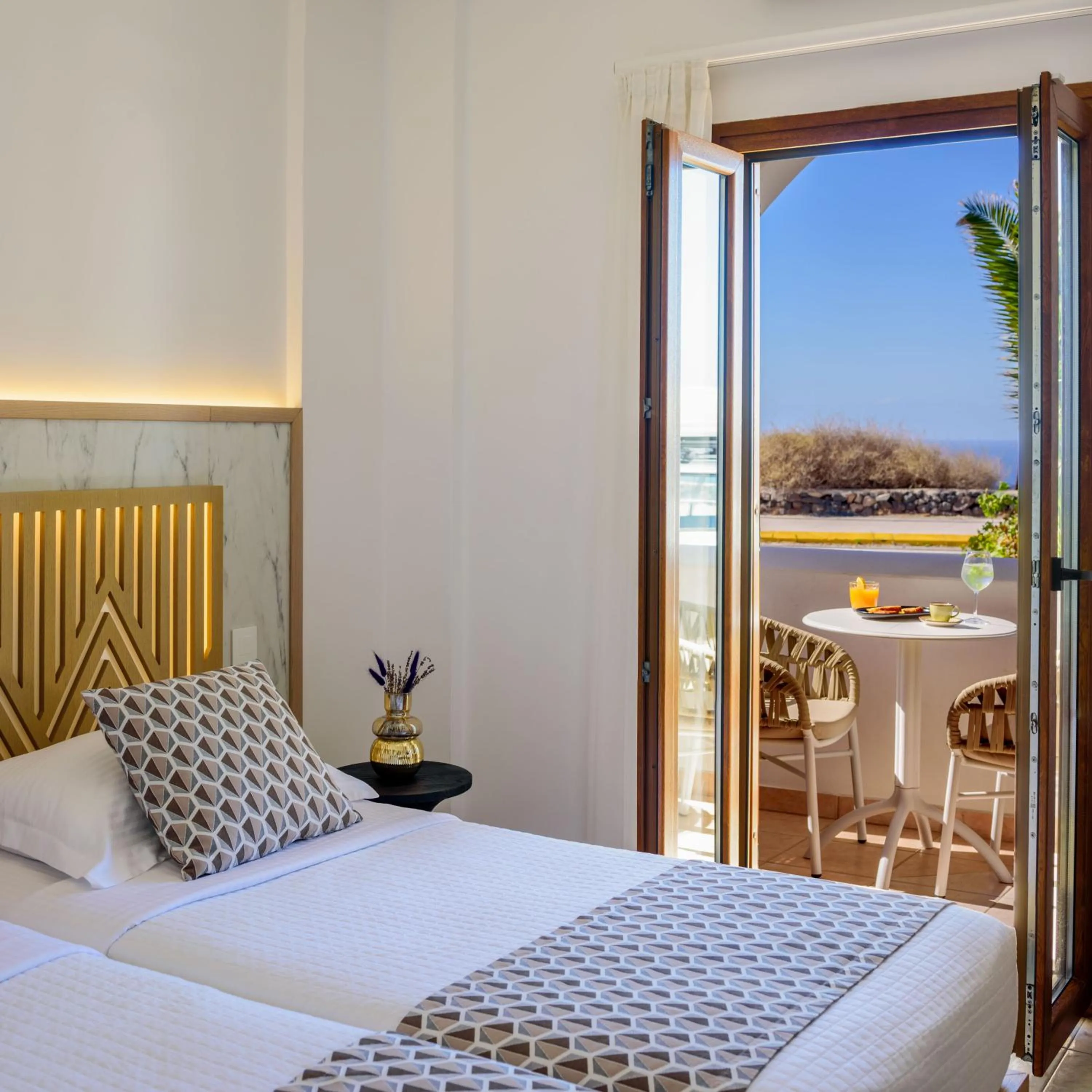 Bed in Astir Thira Hotel