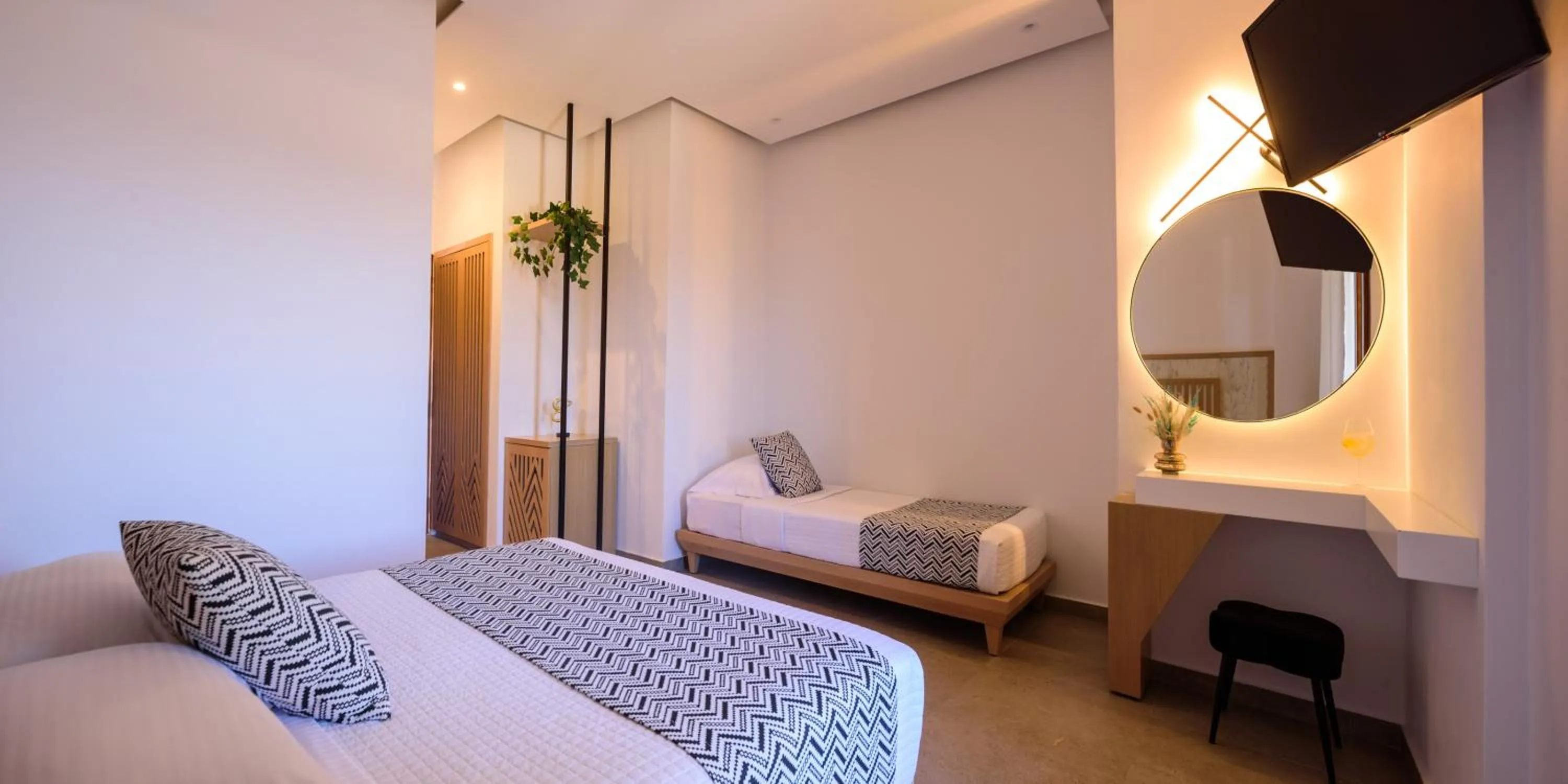 Bed in Astir Thira Hotel