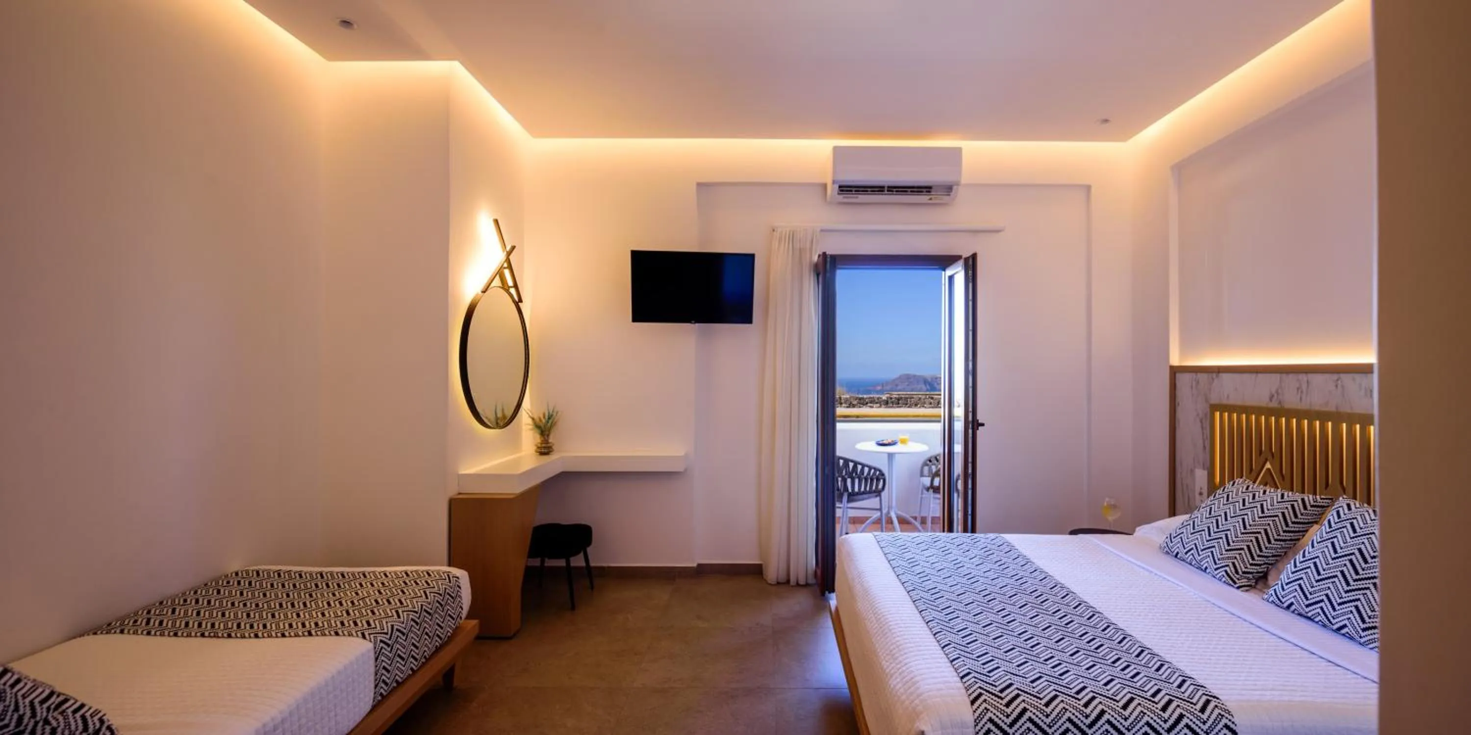 Bed in Astir Thira Hotel