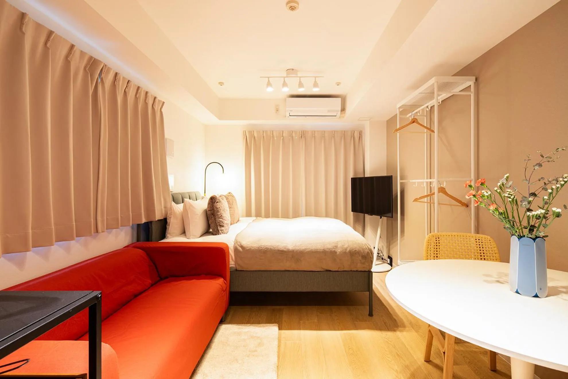 Living room, Bed in Section L Residence Ginza