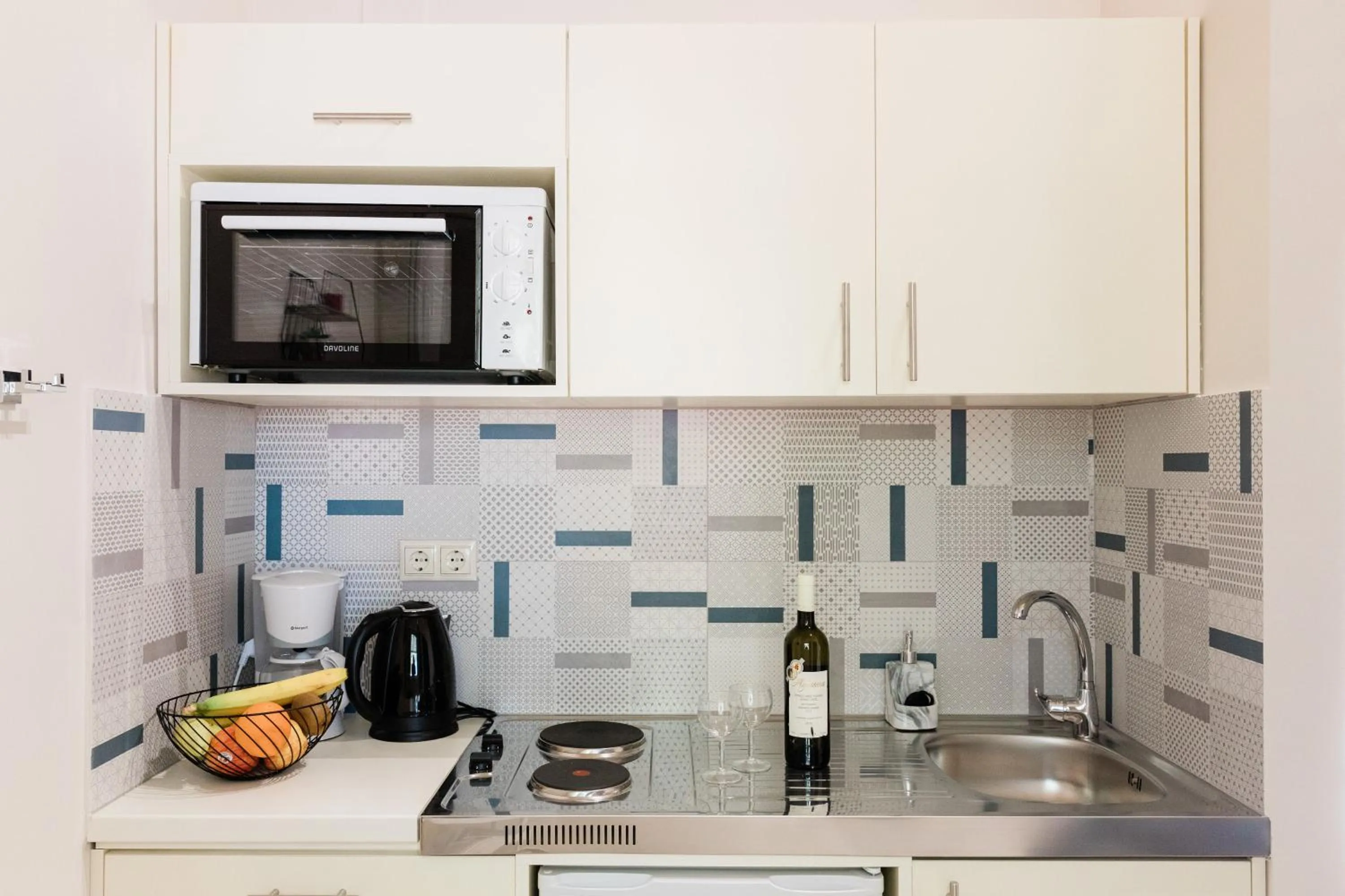 Kitchen or kitchenette in Seadrop Suites