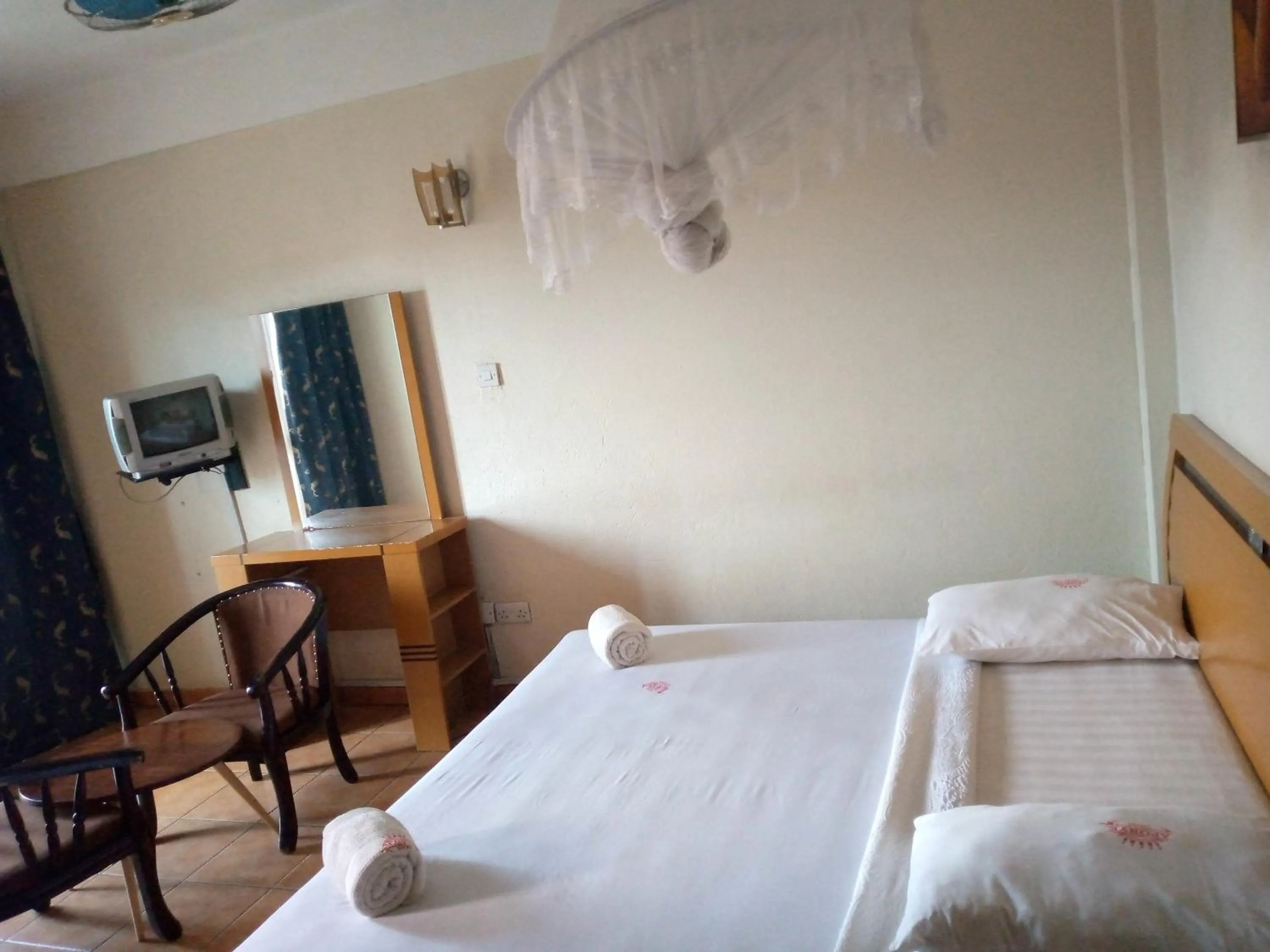 Bed in DOUBLE FIVE HOTEL