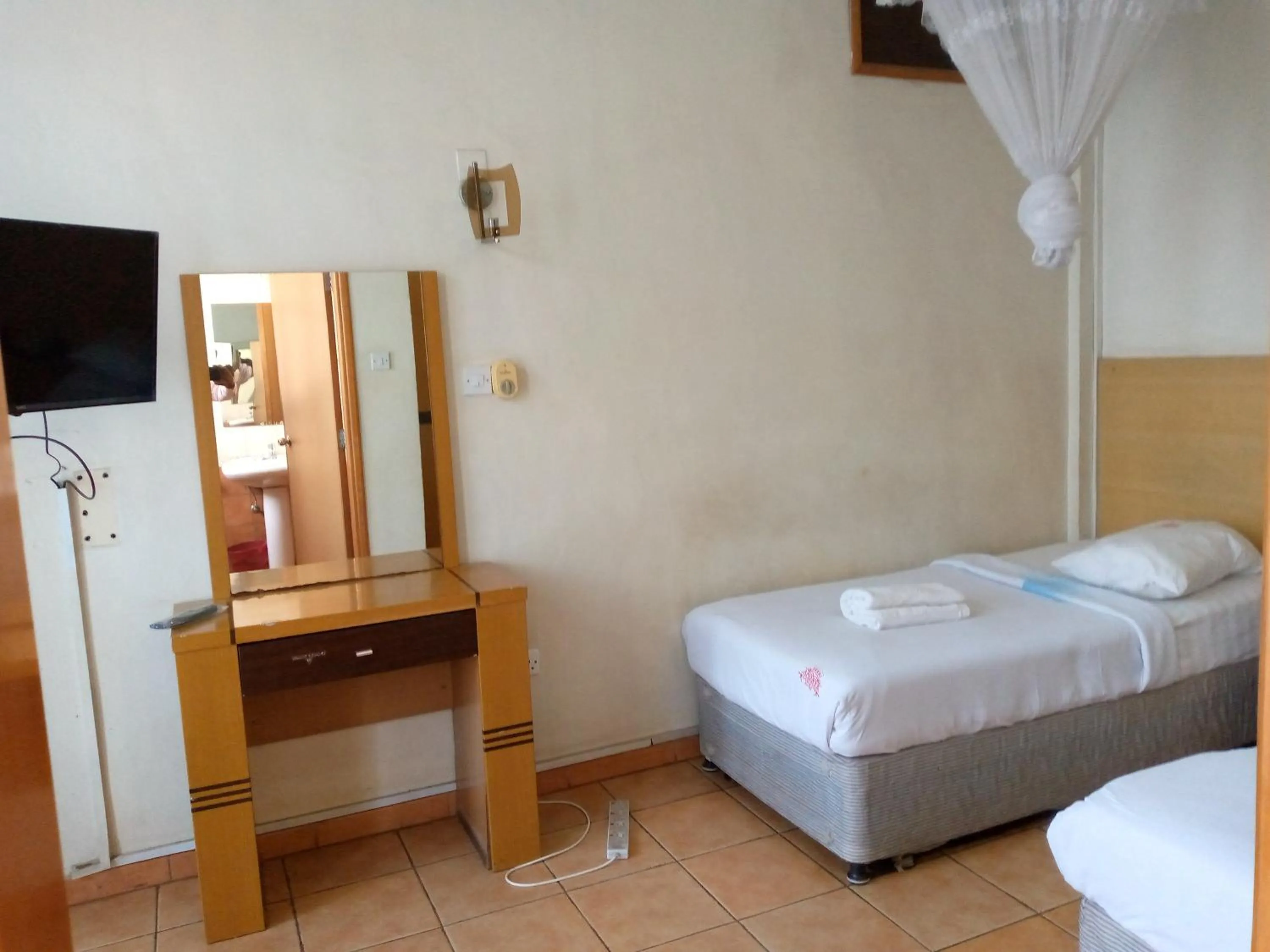 Bed in DOUBLE FIVE HOTEL