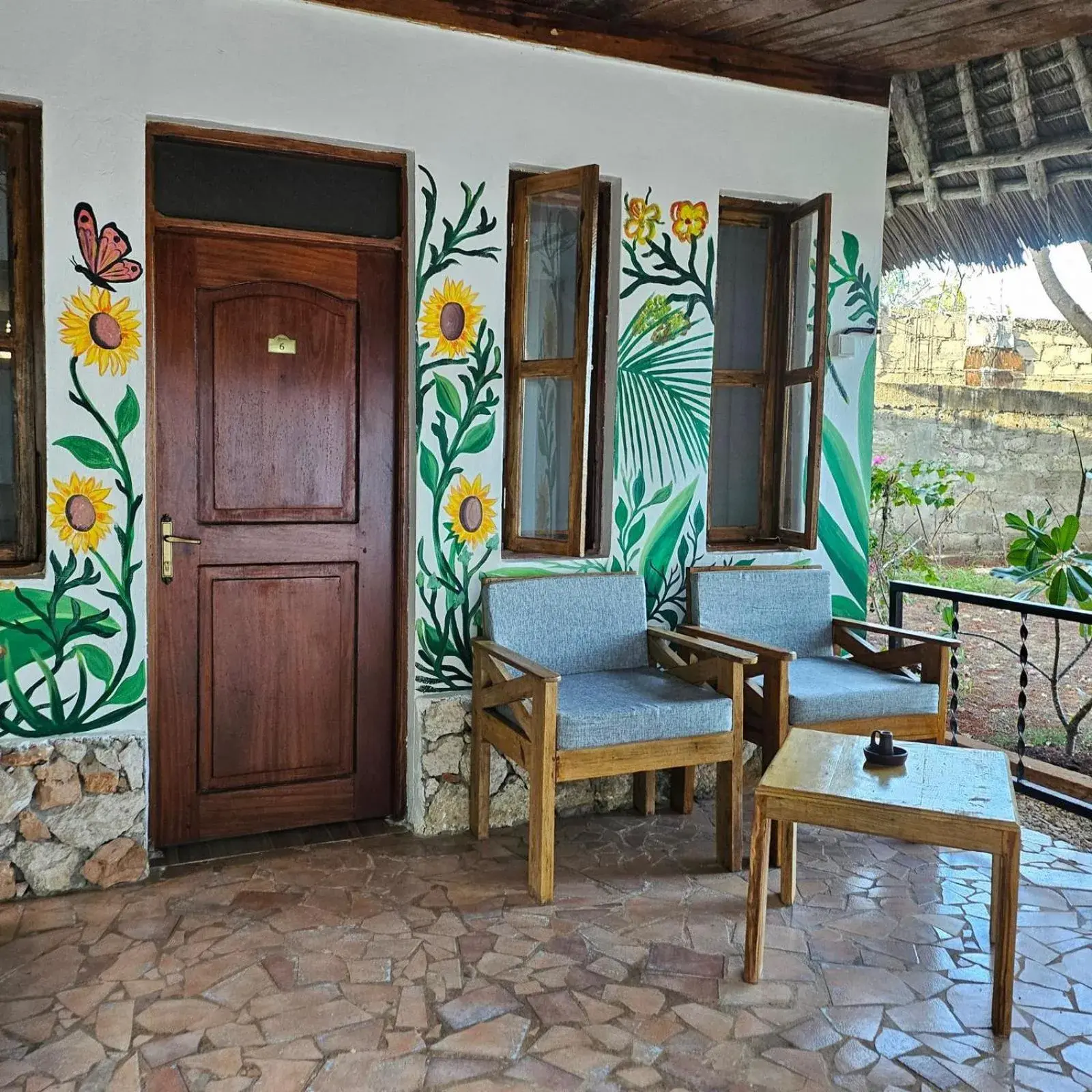 Deluxe Triple Room with Sea View in Mambo Ocean Resort Deluxe Triple Room with Sea View in Mambo Ocean Resort