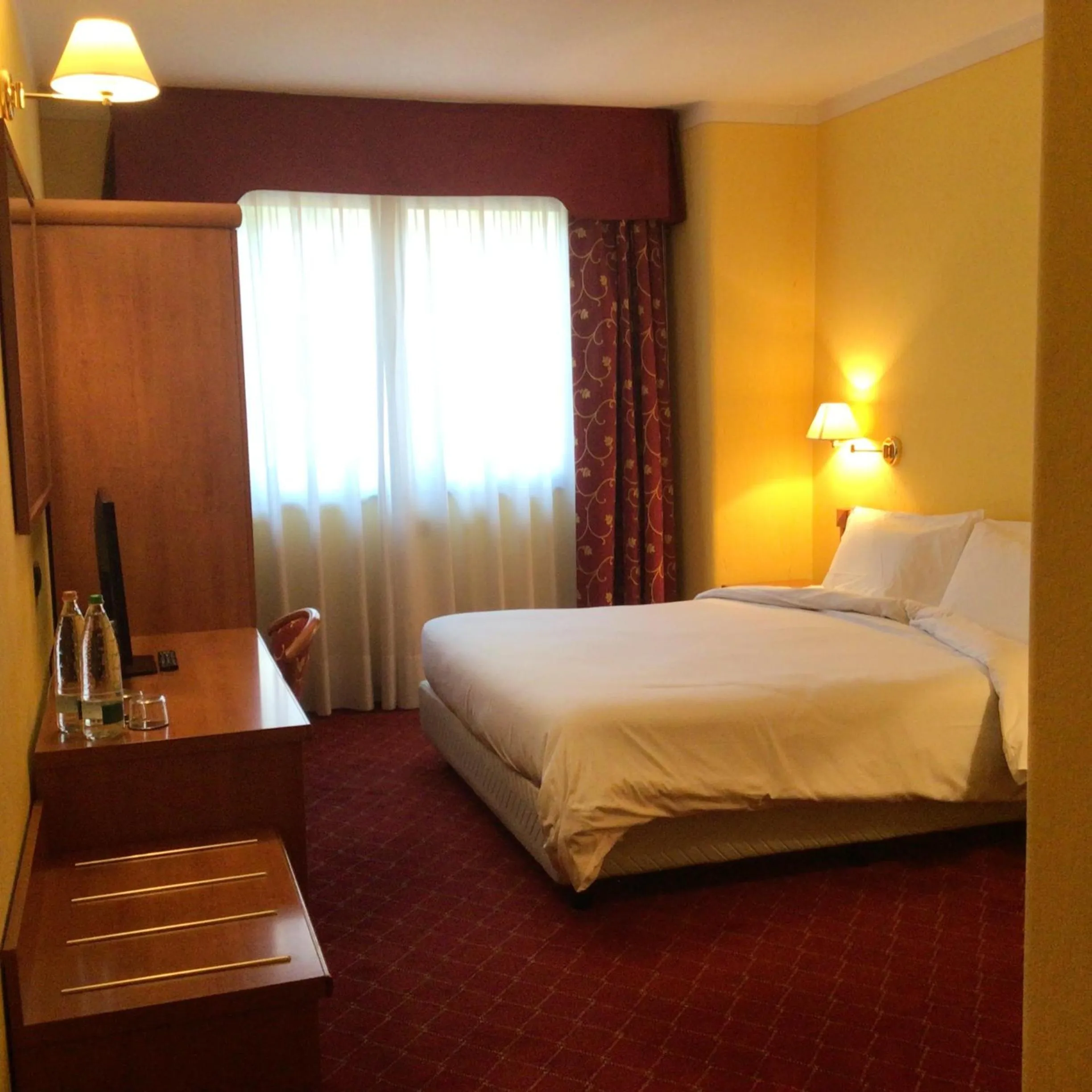 Bed in Essenza Hotel