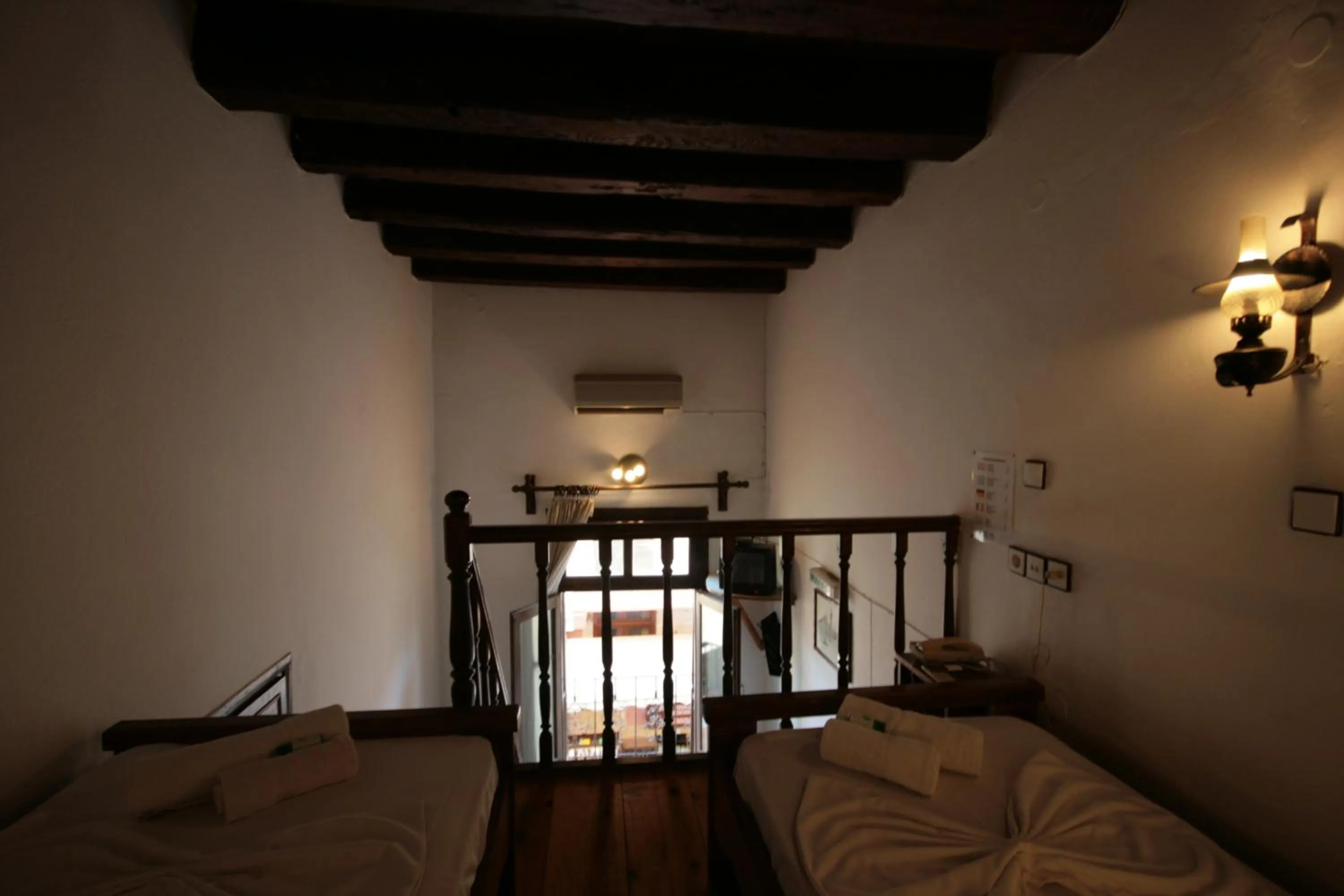 Bed in Chania Rooms