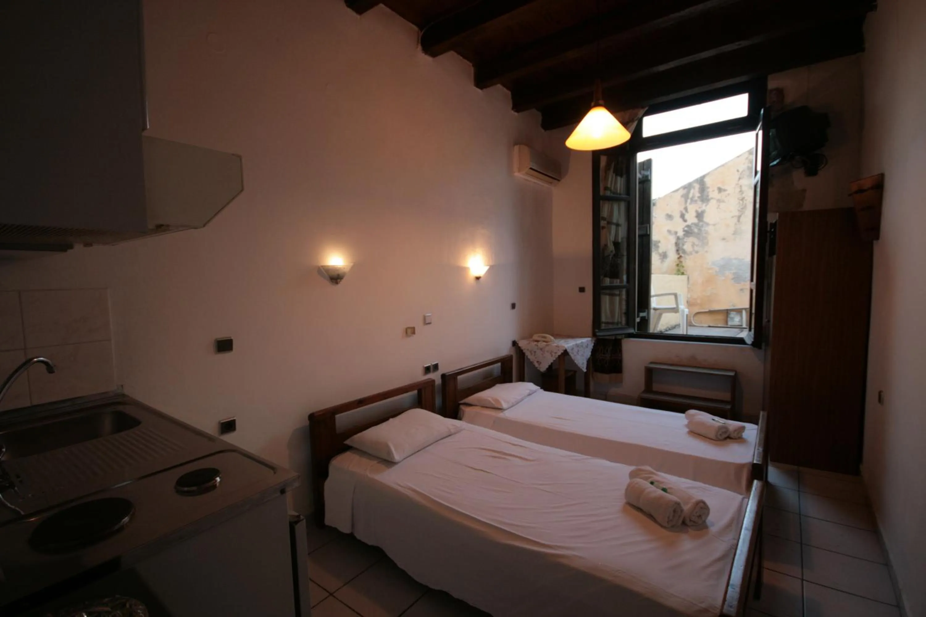 Bed in Chania Rooms