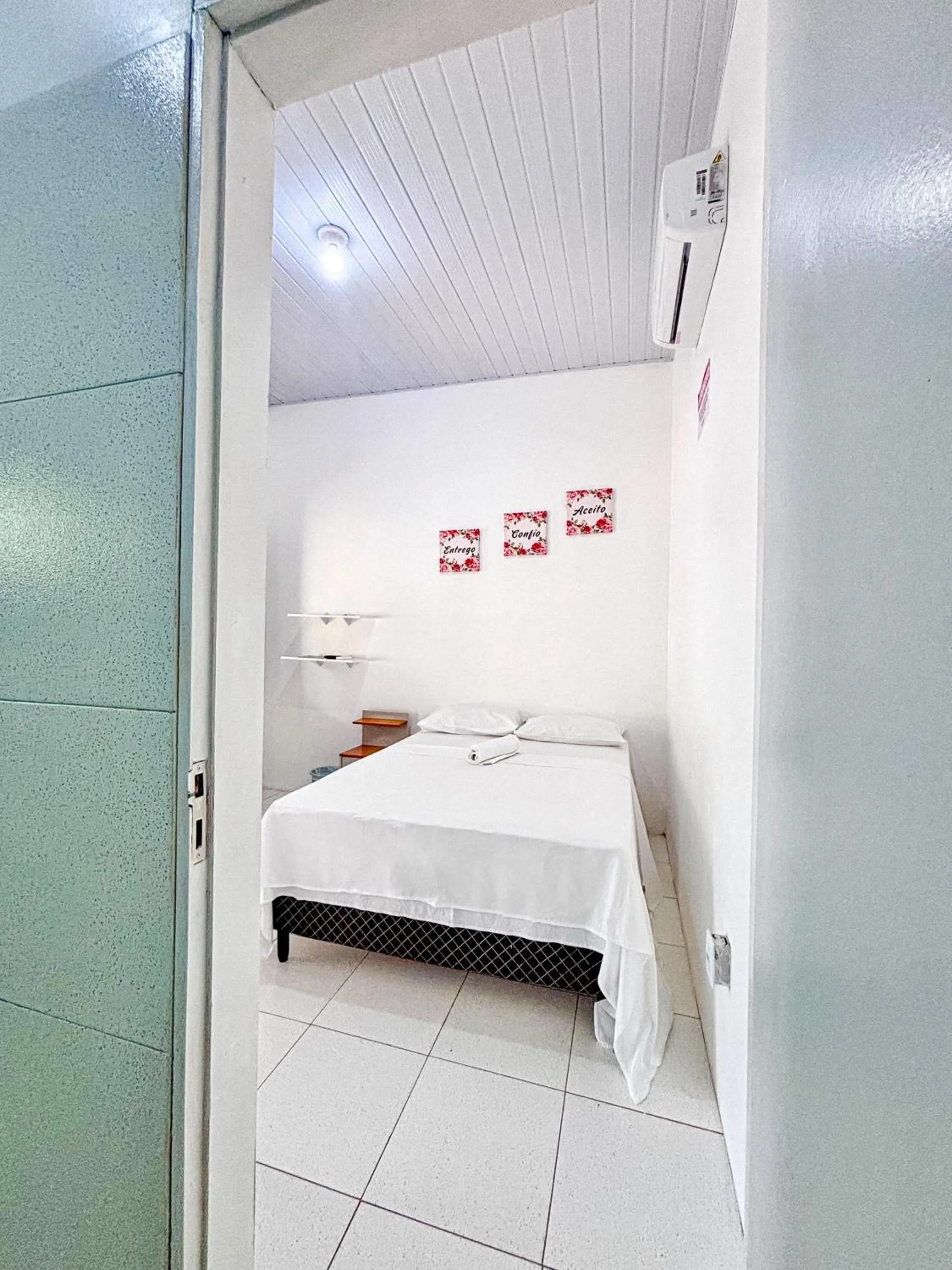 Bed in POUSADA ESTRELA DA MANHÃ