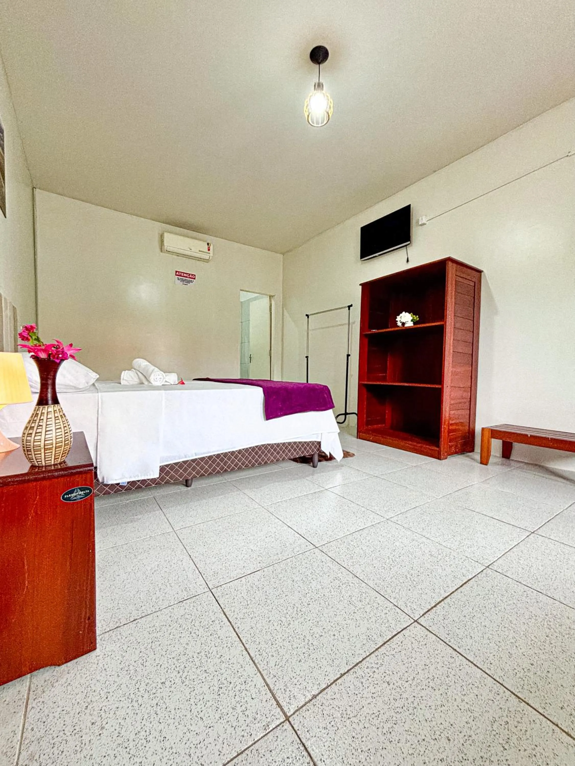 Bed in POUSADA ESTRELA DA MANHÃ