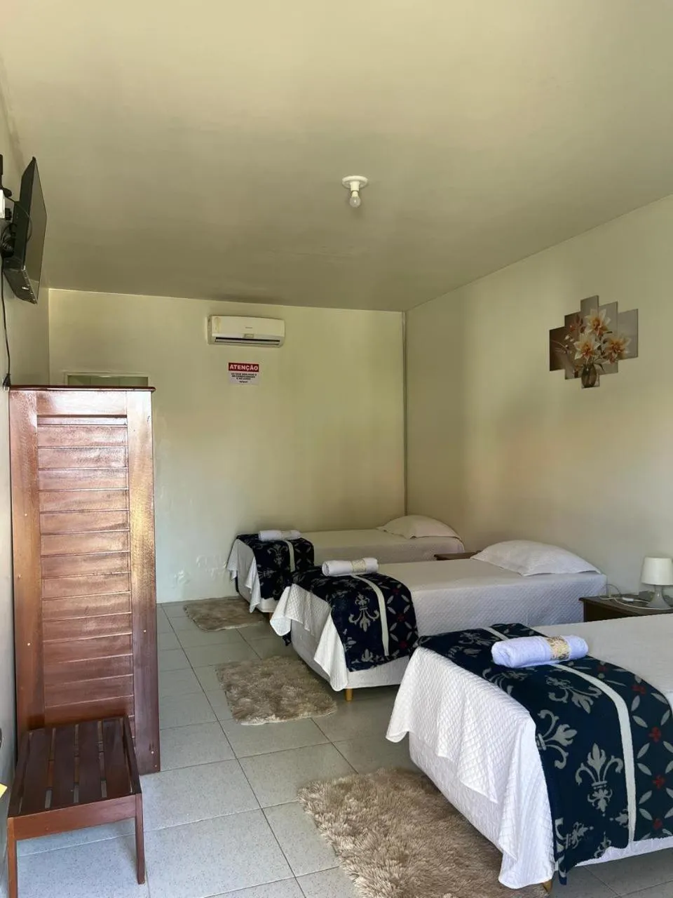 Bed in POUSADA ESTRELA DA MANHÃ